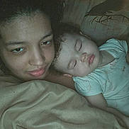 Amber joined the competition — help win amazing prizes! woman, child, sleeping, blanket, bed, curly_hair, face, indoor, closeup, cozy, family, rest, relaxation, skin, pajamas, portrait, love, tired, comfort, intimate