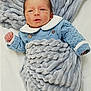 Nolan a rejoint le concours — aidez-le/la à gagner de superbes lots ! baby, bed, blanket, bonnet, clothing, face, furniture, glove, happy, hat, head, knitwear, newborn, person, photography, portrait, quilt, sleeping, sweater, towel