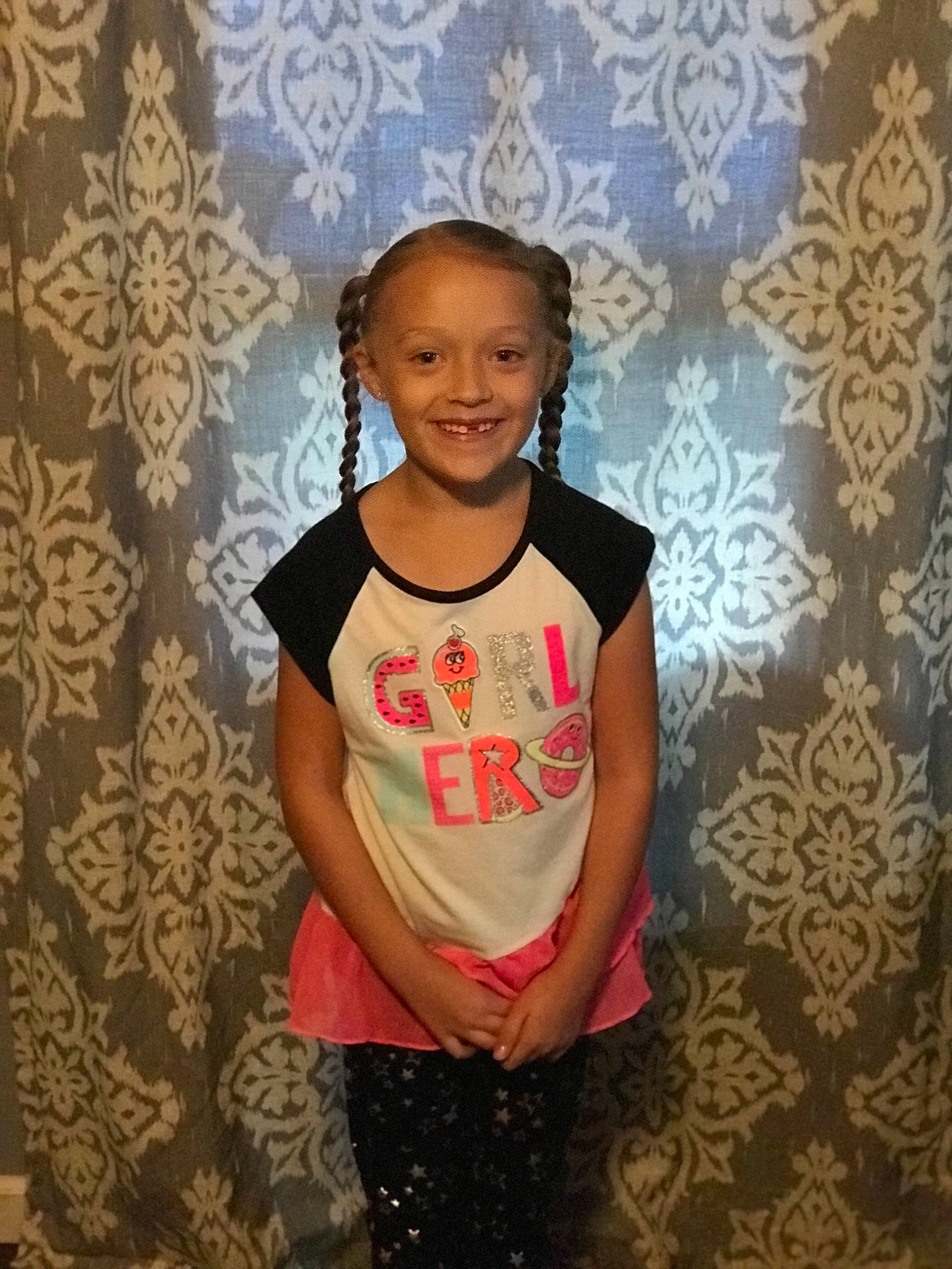 Harmony is registered to the contest to win money with this photo: child, joy, pattern, person, smile, standing, t_shirt, toddler