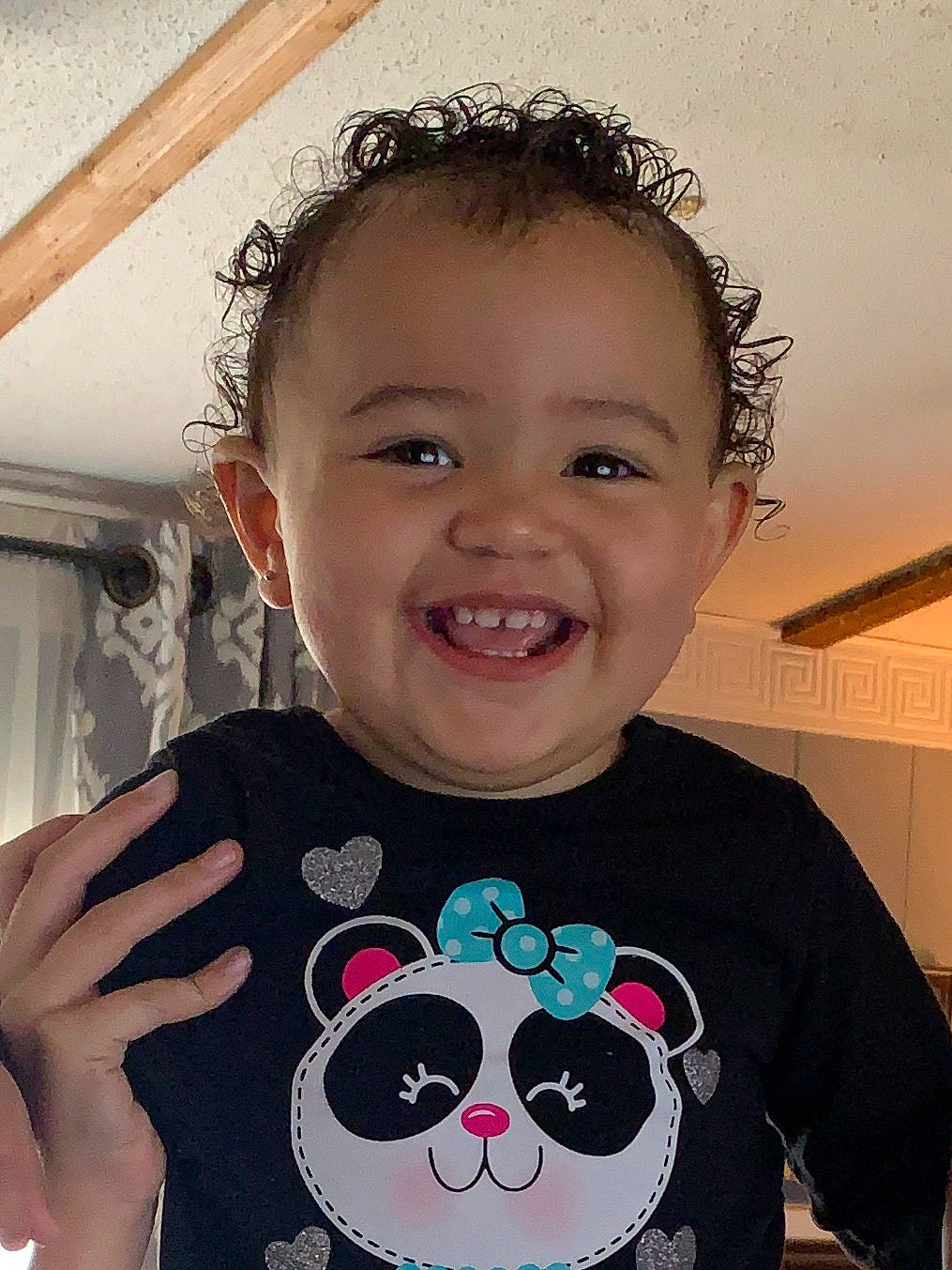 Serenity is registered to the contest to win money with this photo: cheek, child, cool, ear, eye, eyebrow, face, forehead, head, iris, joy, lip, neck, nose, organ, person, smile, t_shirt, toddler, tooth