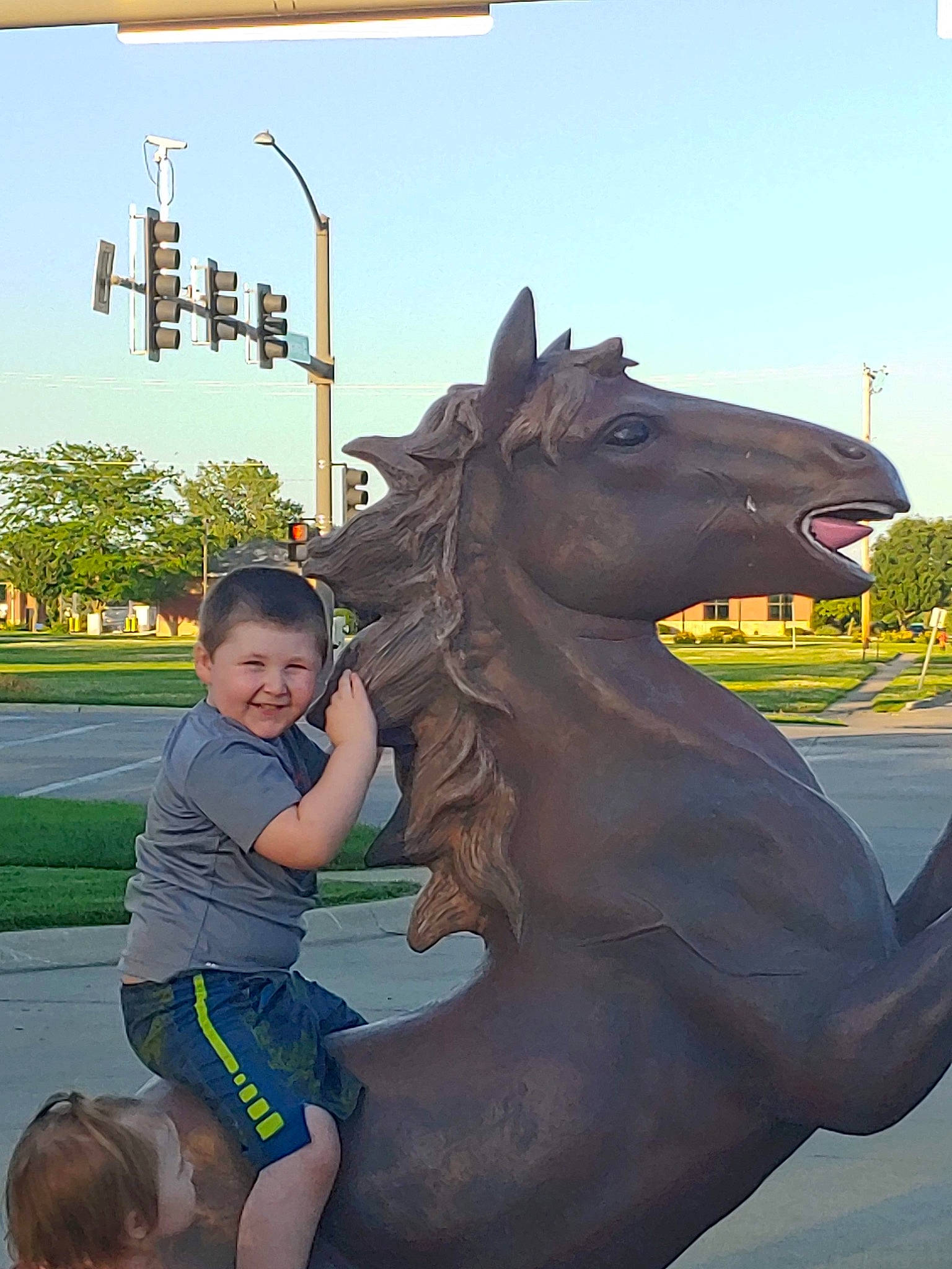 Bentley is registered to the contest to win money with this photo: art, fun, horse, joy, mane, person, sculpture, smile, statue