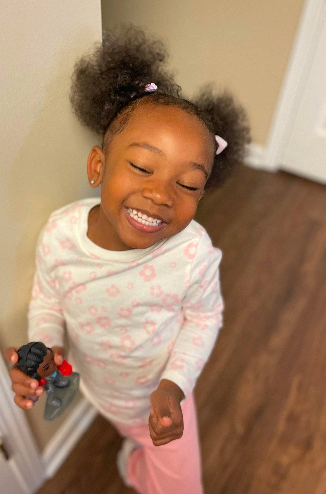 Kinley is registered to the contest to win money with this photo: afro, baby_toddler_clothing, cheek, child, chin, facial_expression, flooring, fun, gesture, happy, human, jheri_curl, joy, lip, nose, person, skin, sleeve, smile, standing