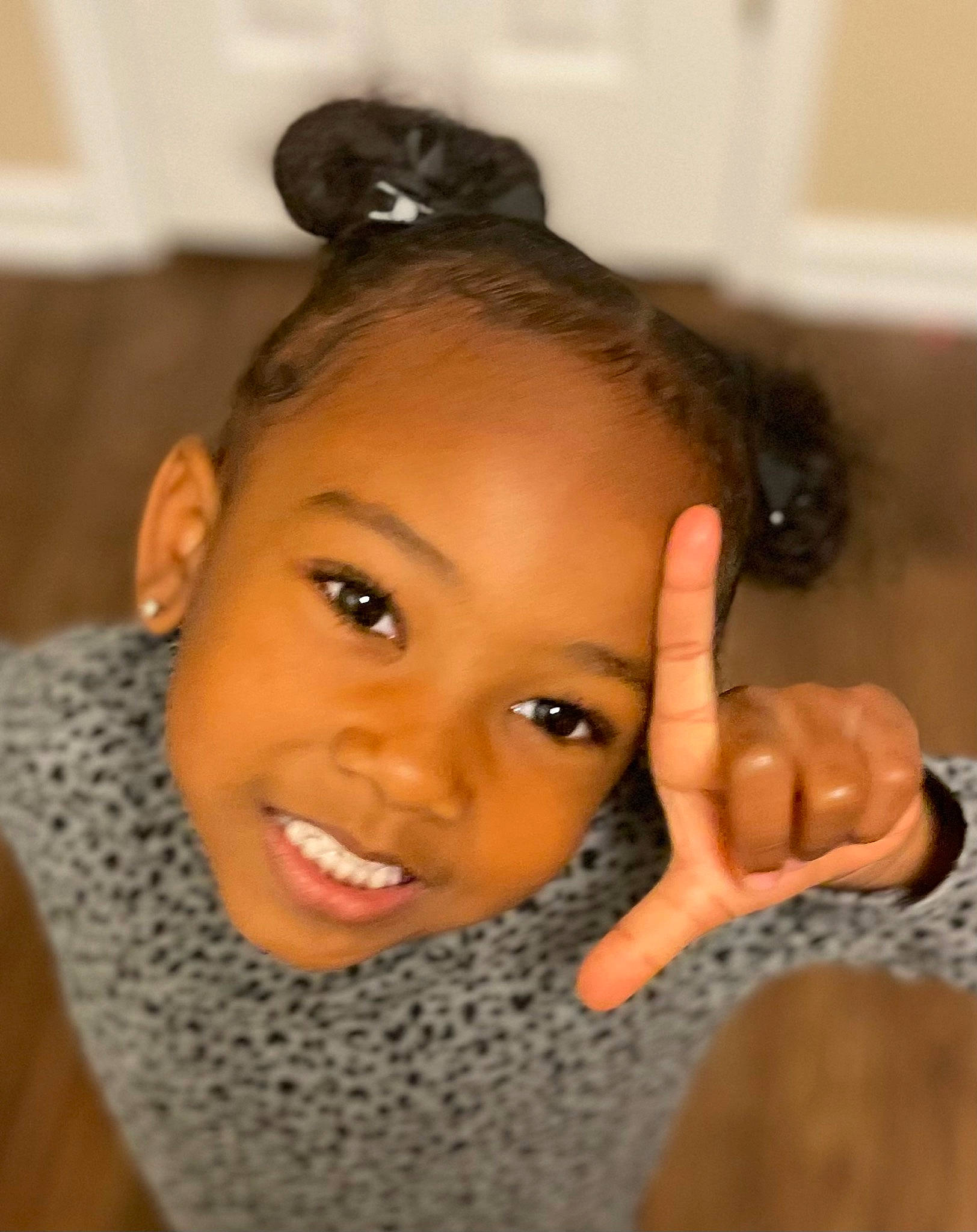 Kinley is registered to the contest to win money with this photo: arm, cheek, chin, ear, eyebrow, eyelash, face, flash_photography, forehead, gesture, happy, human_body, iris, jaw, joy, lip, mouth, neck, nose, person