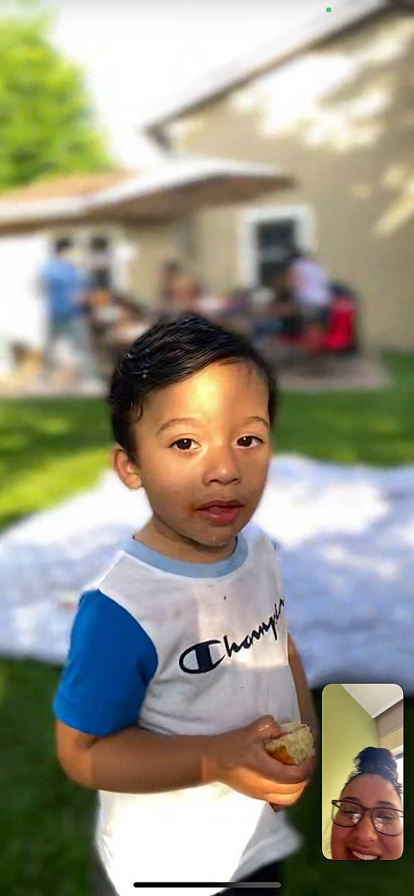 Zacarías is registered to the contest to win money with this photo: child, event, fun, grass, happy, joy, leisure, person, play, recreation, sitting, smile, t_shirt, toddler, travel, vacation