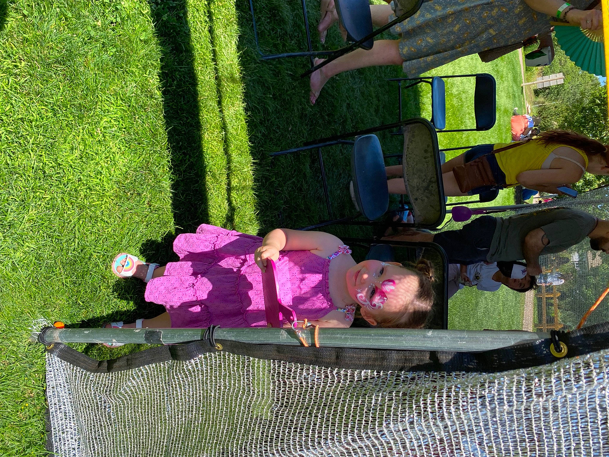 Charlotte joined the competition — help win amazing prizes! baby_products, backyard, child, fun, garden, grass, green, joy, leisure, magenta, outdoor_furniture, person, pink, plant, recreation, toddler, toy, tree, yard