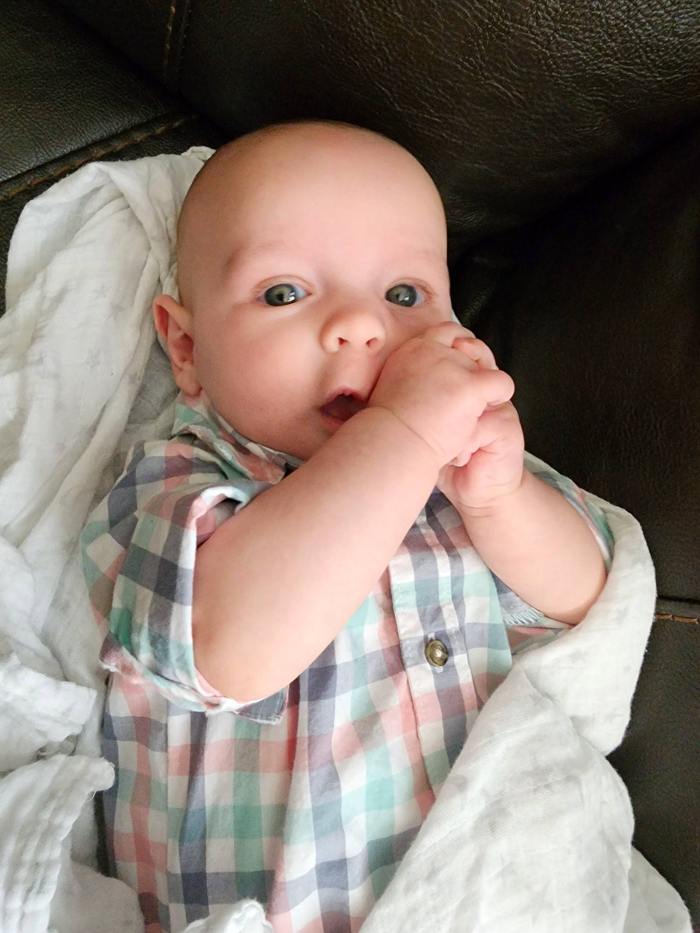 Elijah joined the competition — help win amazing prizes! baby, baby_toddler_clothing, cheek, child, collar, comfort, flash_photography, gesture, linens, lip, mouth, nose, pattern, person, plaid, skin, sleeve, tartan, textile, thumb