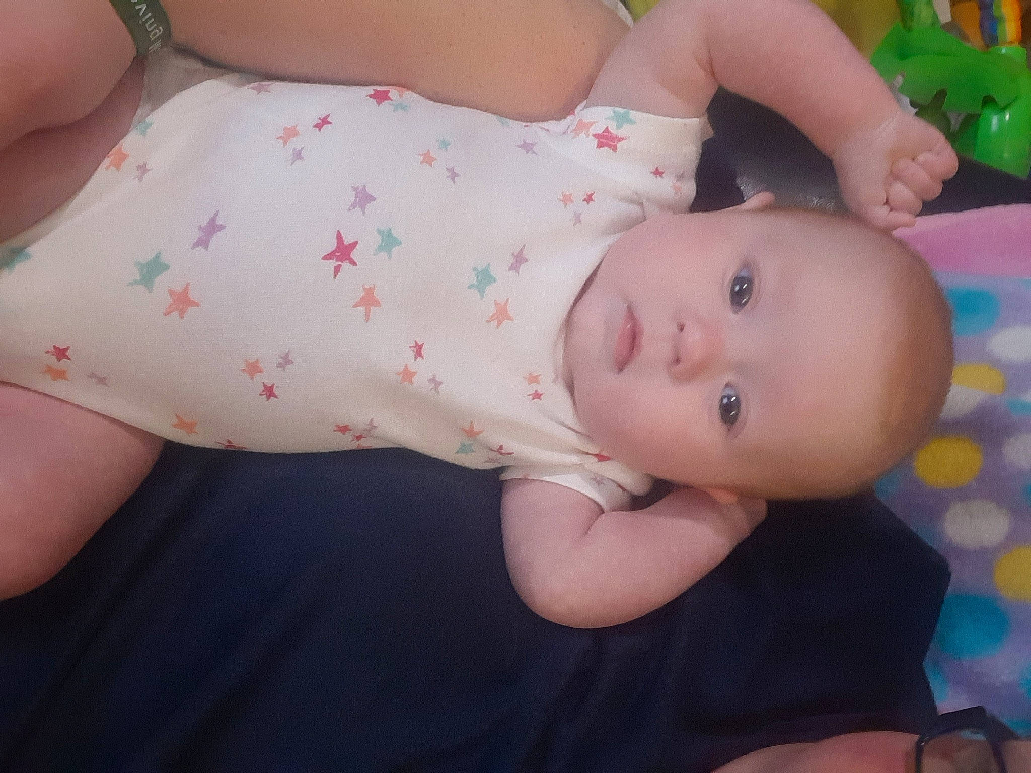 Waylynn is registered to the contest to win money with this photo: abdomen, baby, baby_products, baby_toddler_clothing, beauty, chest, child, comfort, finger, human_body, human_leg, nail, pattern, person, pink, plant, skin, sleeve, thigh, toddler