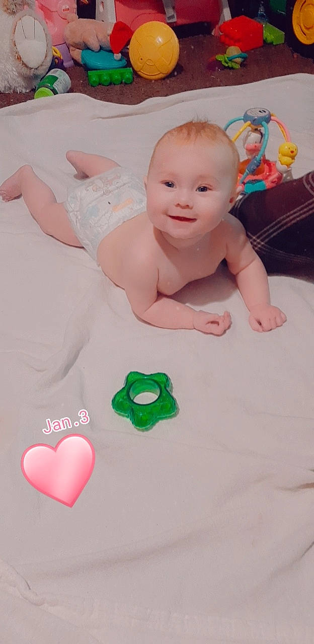 Waylynn joined the competition — help win amazing prizes! baby, baby_products, baby_toddler_clothing, cheek, child, finger, flooring, fun, happy, joy, linens, nail, pattern, person, pink, product, room, skin, smile, textile