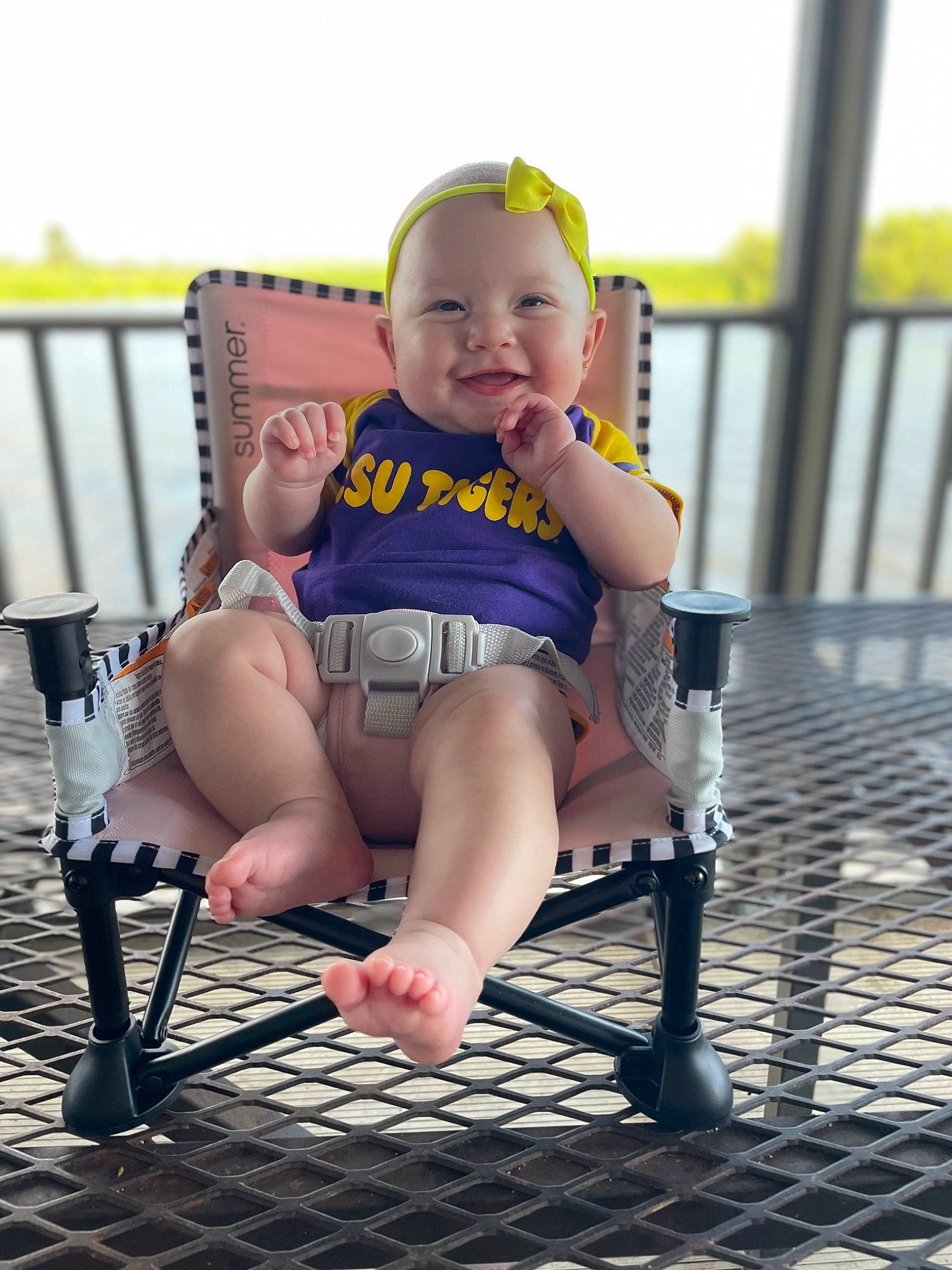 Emersyn joined the competition — help win amazing prizes! baby, baby_toddler_clothing, chair, child, face, fence, flash_photography, foot, happy, hat, human_leg, joy, knee, leg, leisure, person, sitting, skin, smile, thigh