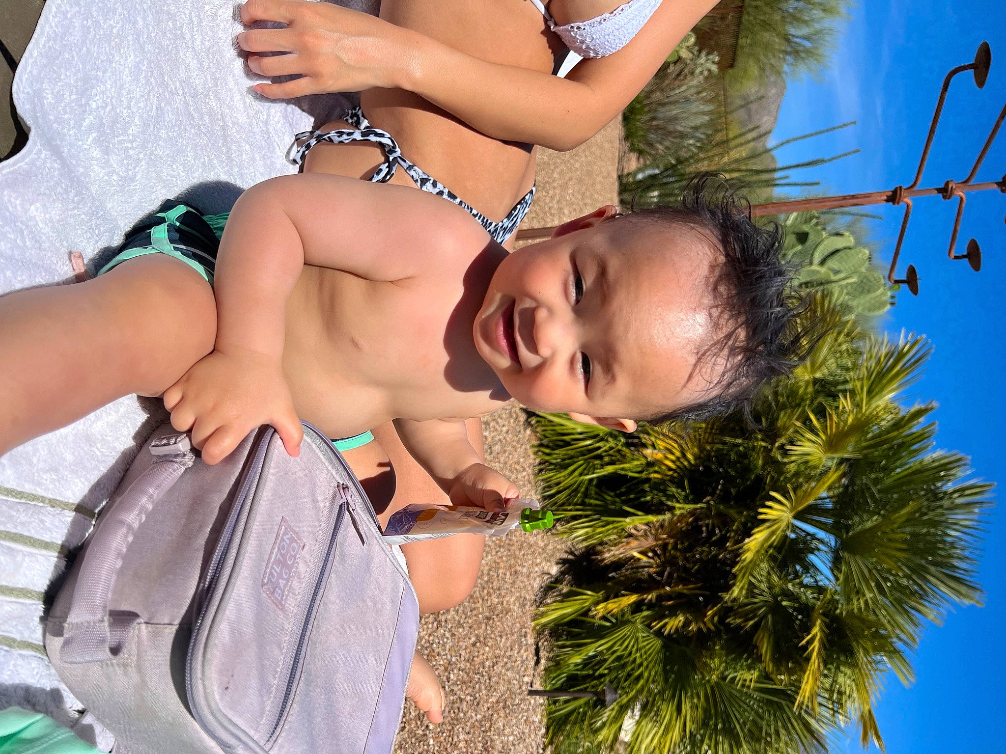 Jaire is registered to the contest to win money with this photo: abdomen, arecales, azure, barechested, chest, child, fun, grass, happy, leisure, navel, people, people_in_nature, people_on_beach, person, smile, summer, swimwear, thigh, toddler