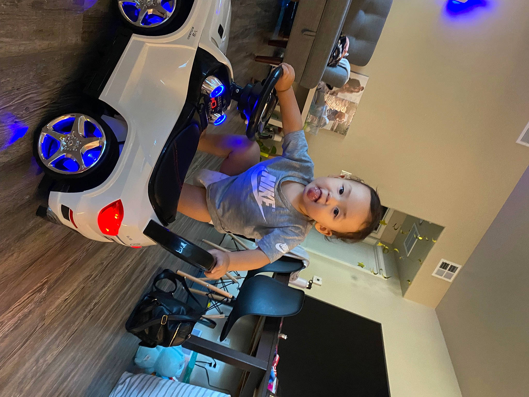 Jaire is registered to the contest to win money with this photo: aerospace_engineering, audio_equipment, auto_part, automotive_design, automotive_exterior, automotive_tire, automotive_wheel_system, blue, elbow, electric_blue, engineering, fun, machine, person, personal_protective_equipment, rim, room, service, space, surprise