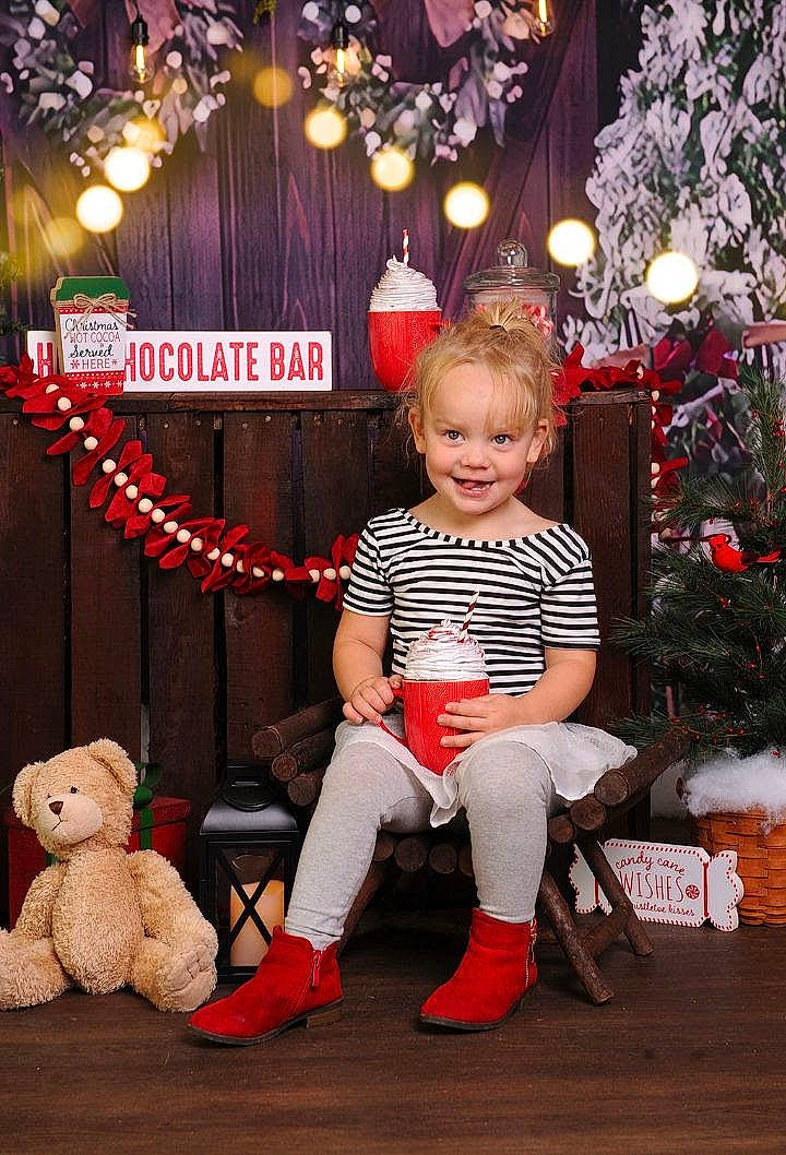 Tia joined the competition — help win amazing prizes! beauty, child, christmas, christmas_decoration, christmas_eve, christmas_ornament, christmas_tree, curtain, decoration, event, fun, happy, holiday, joy, lap, ornament, person, red, toddler, toy