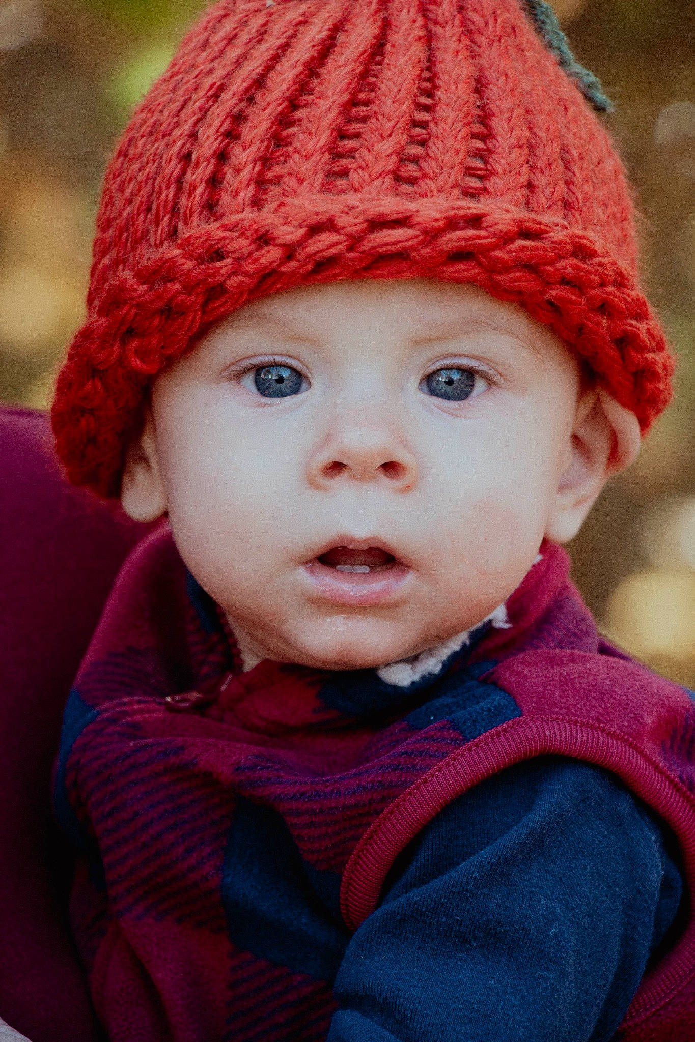 Kolson joined the competition — help win amazing prizes! baby, blue, cap, cheek, chin, clothing, eye, face, head, headgear, headwear, lip, magenta, outerwear, person, photograph, pink, product, red, textile