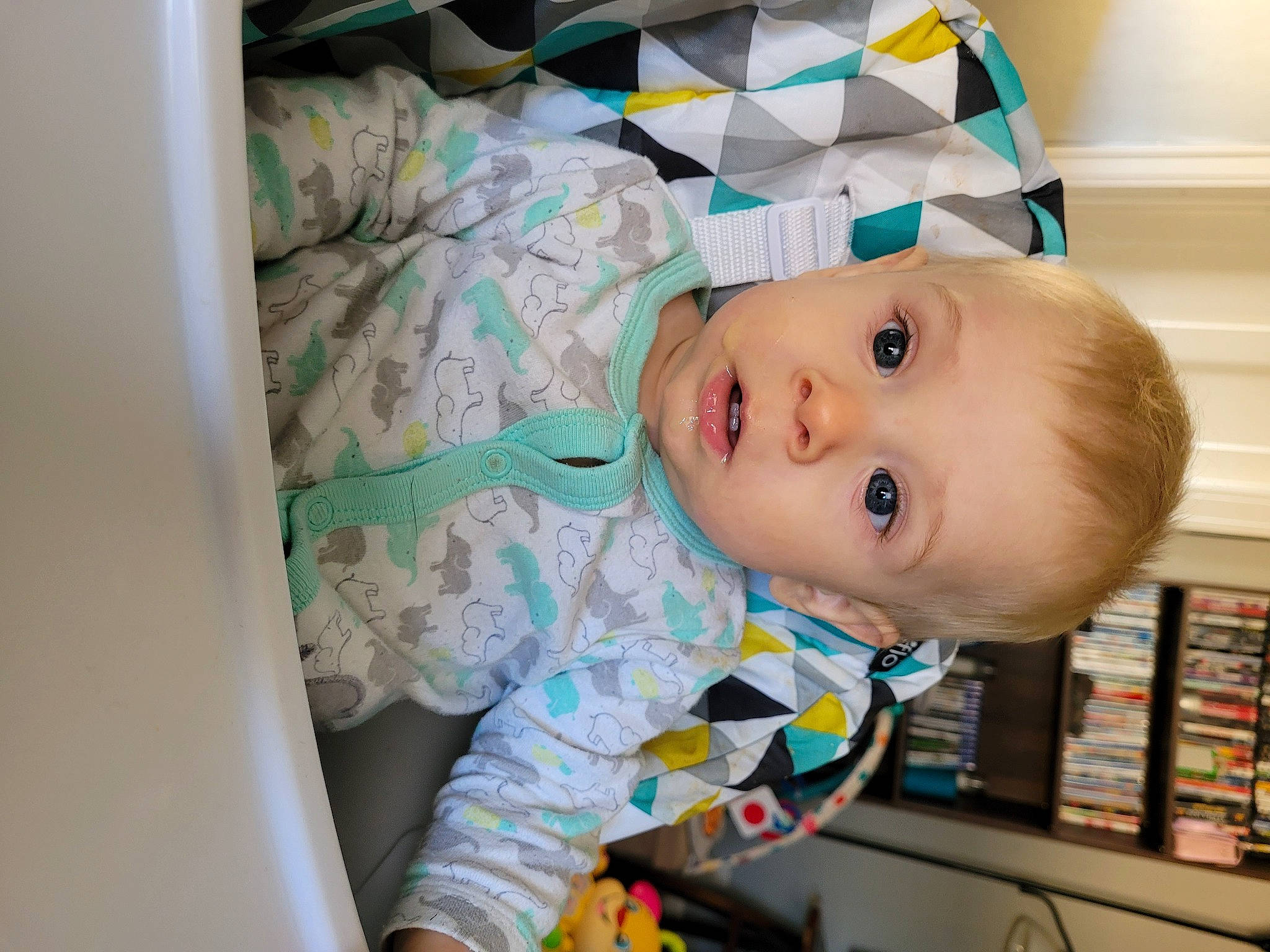 Kolson joined the competition — help win amazing prizes! baby, baby_products, baby_safety, baby_toddler_clothing, bookcase, cheek, child, clothing, comfort, eye, face, head, human_body, iris, nose, person, shelf, shelving, skin, sleeve