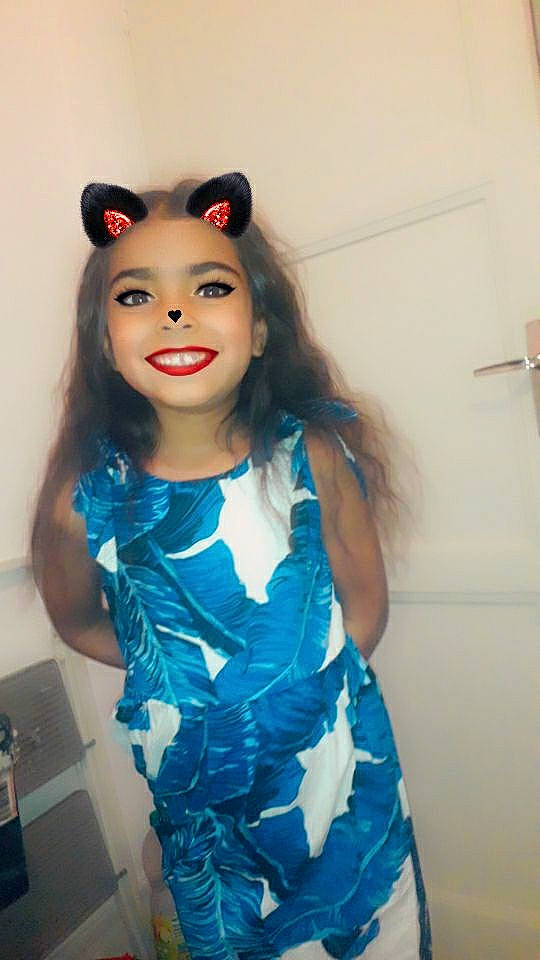 Amélya participe au concours pour gagner de l'argent avec cette photo : black_hair, clothing, day_dress, dress, electric_blue, eyelash, face, fashion_design, gesture, happy, iris, jewellery, joy, lipstick, long_hair, makeover, neck, one_piece_garment, person, sleeve