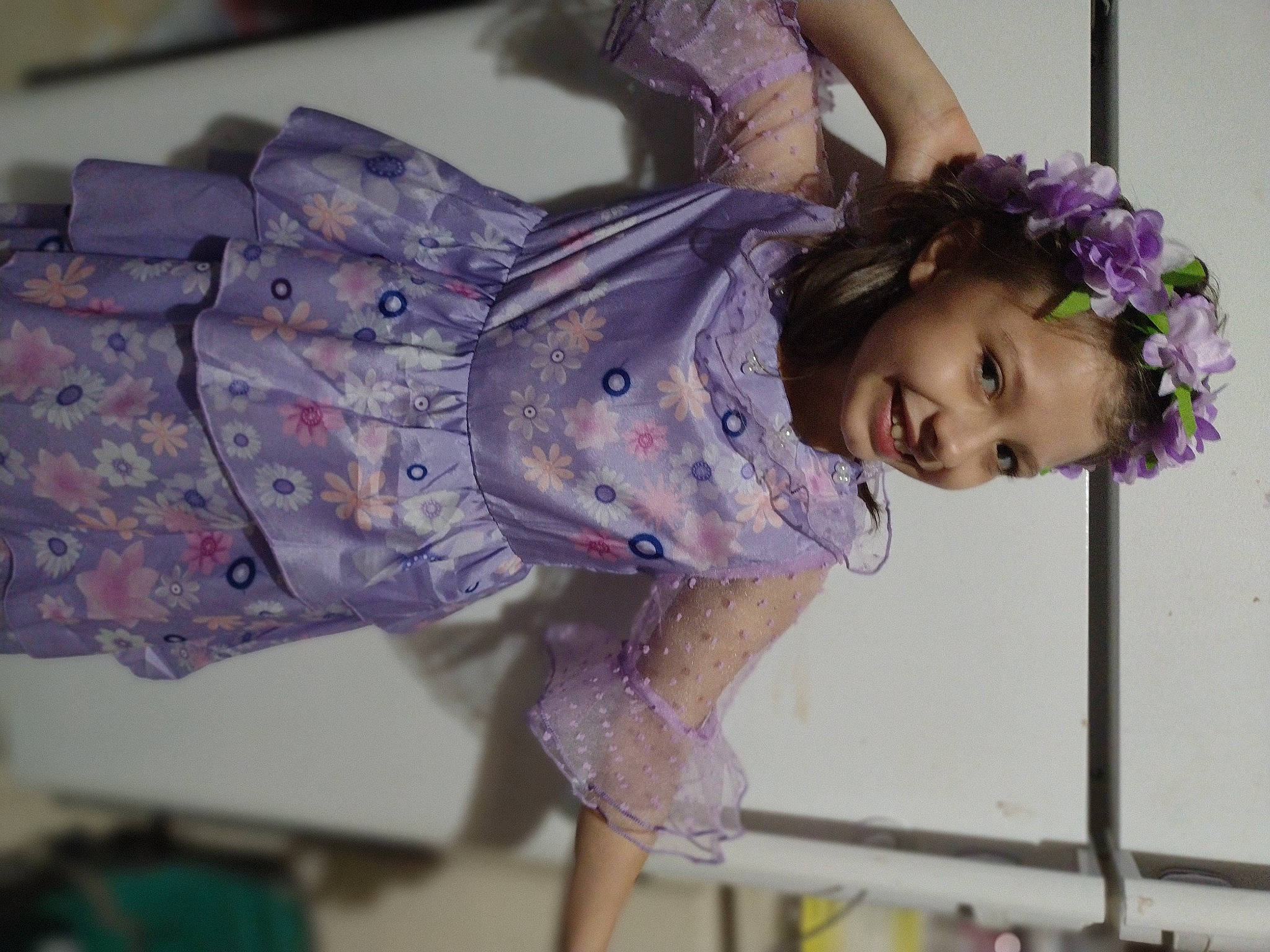 Evalynn is registered to the contest to win money with this photo: child, costume, event, fashion_design, fun, happy, human_leg, joy, magenta, pattern, person, pink, plant, purple, skin, sleeve, smile, thigh, toddler, violet