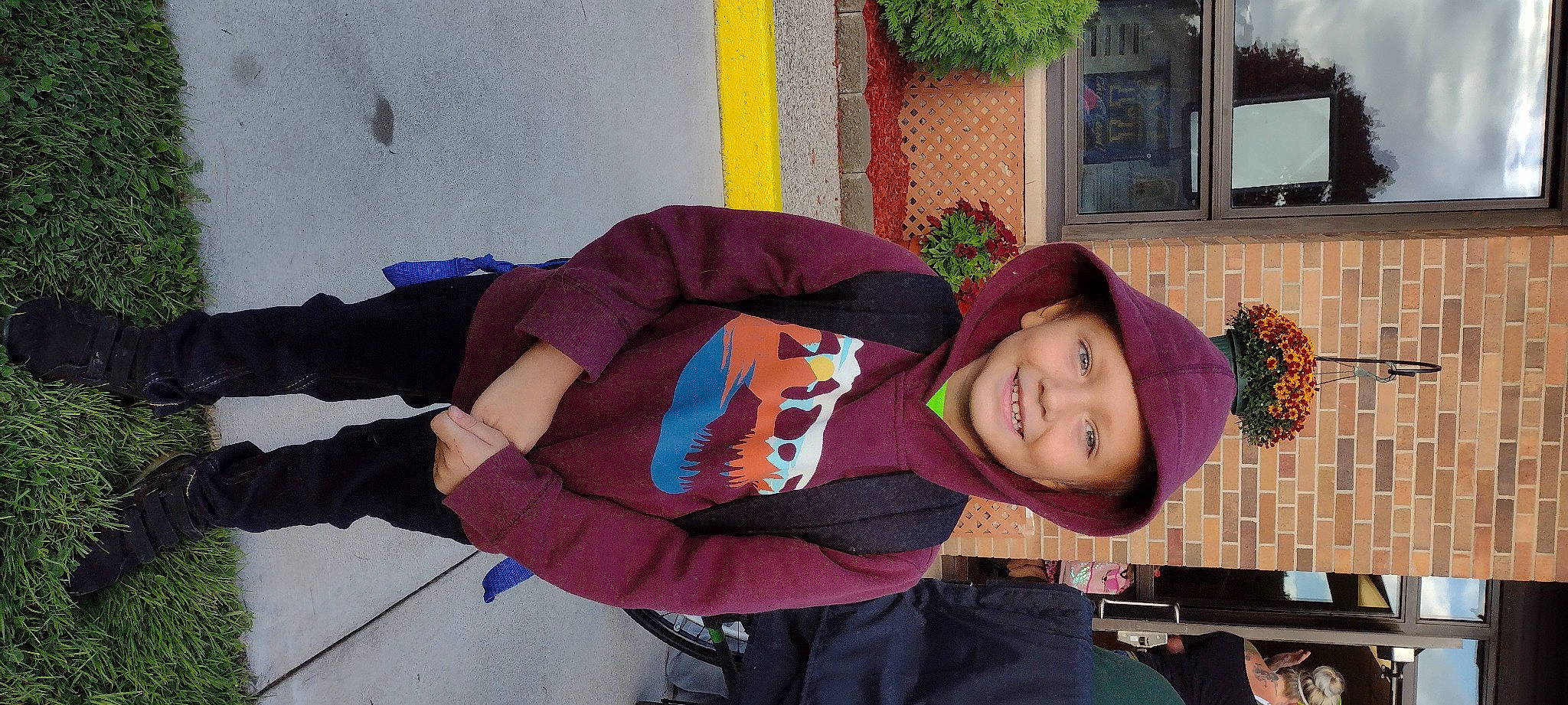 Bentley is registered to the contest to win money with this photo: costume, fashion_accessory, flowerpot, fun, happy, hat, headwear, houseplant, joy, magenta, person, picture_frame, plant, purple, room, sleeve, smile, sun_hat, vacation, winter