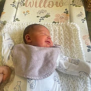 Willow is registered to the contest to win money with this photo: baby, bed, blanket, crib, cushion, face, furniture, head, homedecor, infantbed, newborn, person, photography, pillow, portrait, quilt, sleeping, towel
