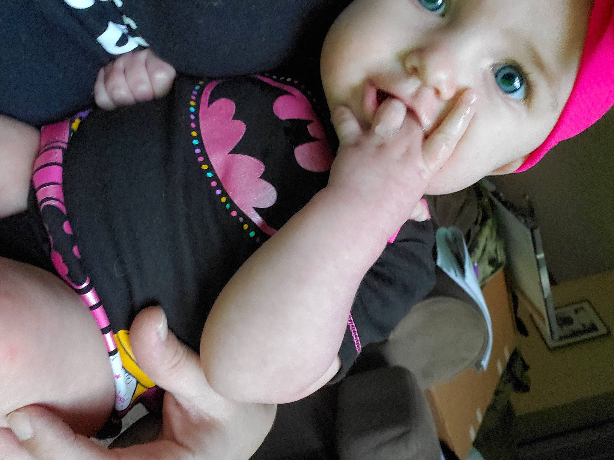 Harleen is registered to the contest to win money with this photo: baby, car_seat, cheek, child, finger, gesture, hand, lip, mouth, nail, person, pink, smile, thumb, toddler, tongue, tooth