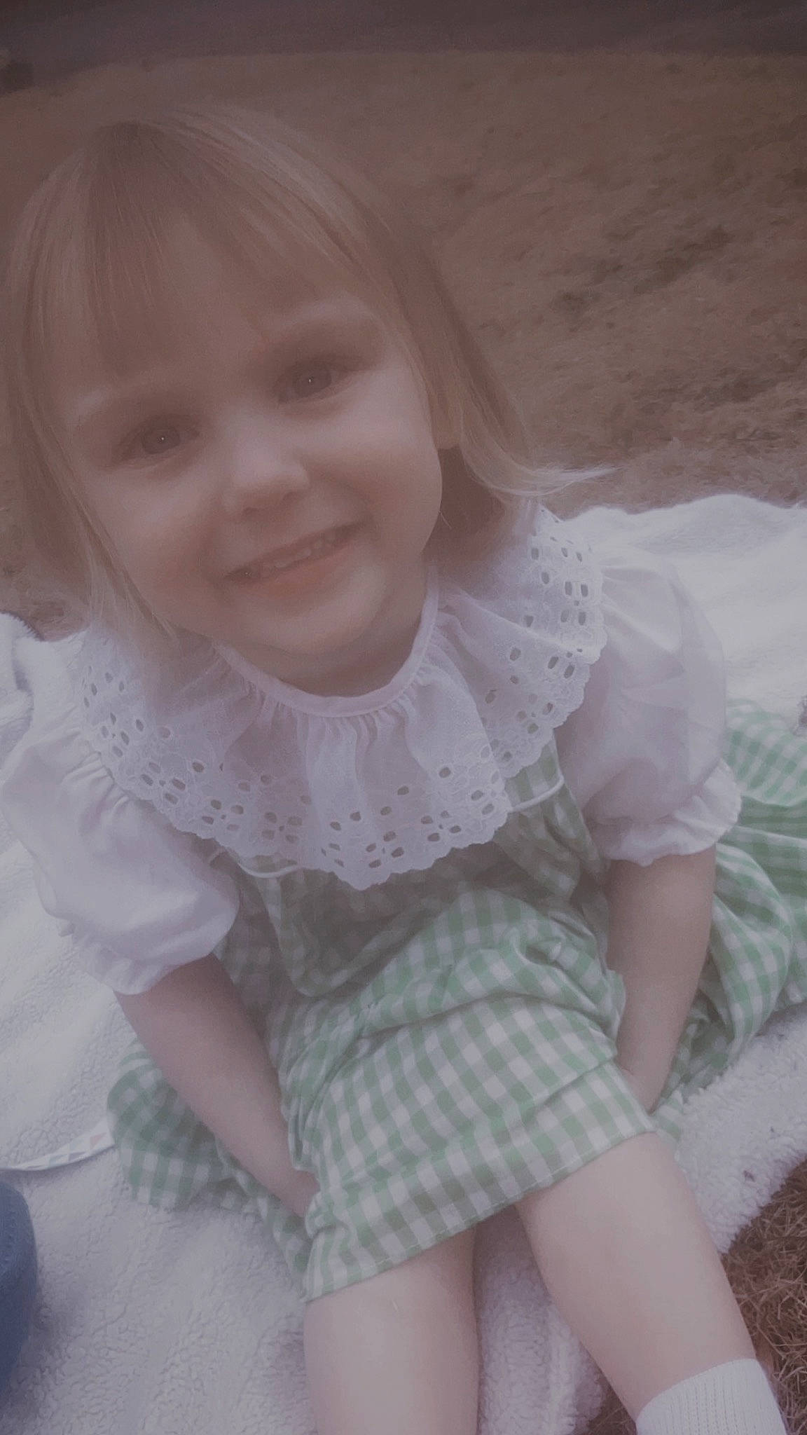 Chelsea is registered to the contest to win money with this photo: baby, baby_toddler_clothing, cheek, chin, dress, embellishment, eye, finger, happy, human_body, iris, joy, lip, mouth, outerwear, person, pink, skin, sleeve, smile