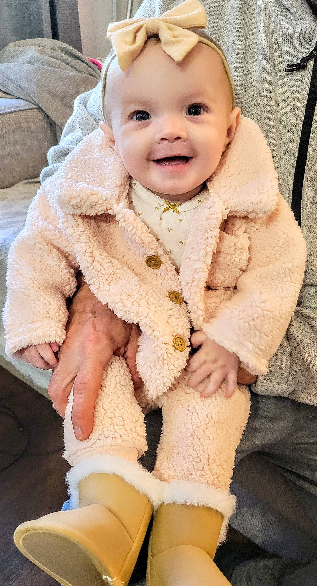 Brookelynn is registered to the contest to win money with this photo: baby, baby_toddler_clothing, cap, child, dress, finger, fur, grass, hand, happy, head, joy, lip, pattern, person, skin, sleeve, smile, thigh, thumb