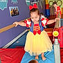 child, girl, dress, snow_white_costume, bow, gymnastics, gym, balance, barefoot, play, children, colorful, mats, bars, indoor, fun, activity, young, cute, happy