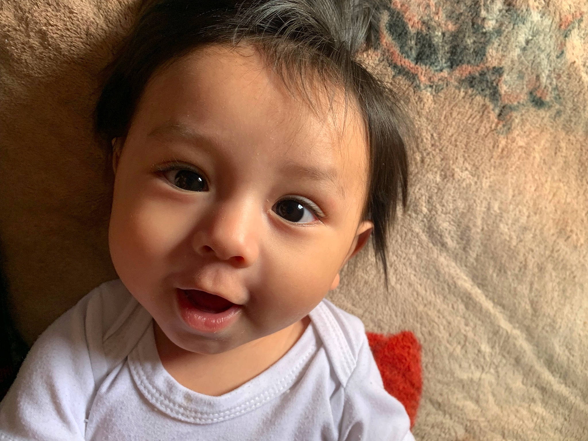 Nuzias joined the competition — help win amazing prizes! baby_toddler_clothing, beauty, black_hair, cheek, child, chin, eyebrow, eyelash, face, facial_expression, grass, happy, iris, lip, mouth, nose, person, skin, sleeve, smile