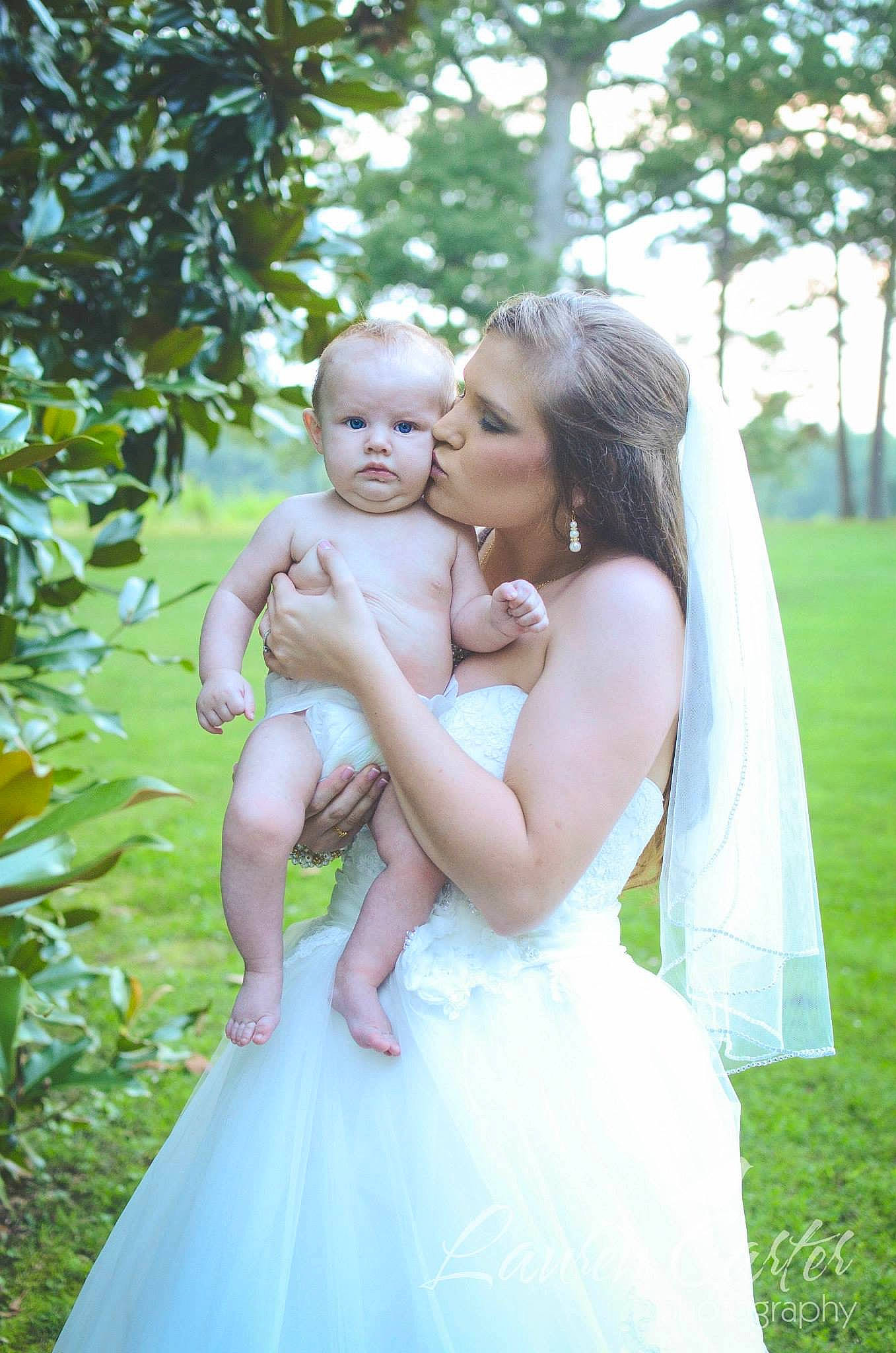 Wesley joined the competition — help win amazing prizes! bridal_accessory, bridal_clothing, bride, ceremony, child, dress, event, formal_wear, fun, gown, grass, green, happy, interaction, people_in_nature, person, photograph, photography, smile, wedding