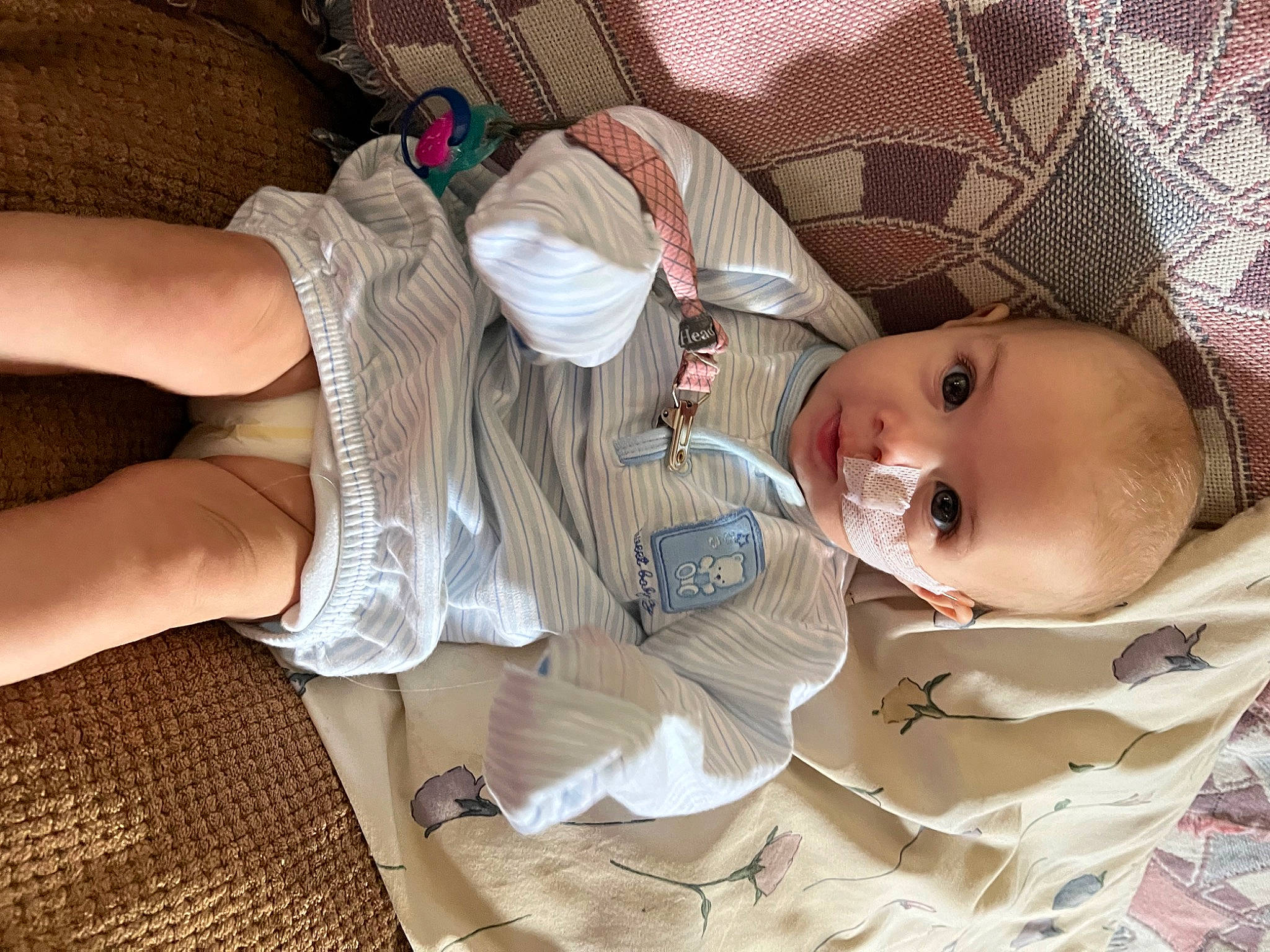 Amiyah is registered to the contest to win money with this photo: arm, baby, baby_products, baby_sleeping, baby_toddler_clothing, cheek, child, comfort, elbow, eye, hand, human_body, human_leg, linens, mouth, person, skin, sleeve, textile, thigh