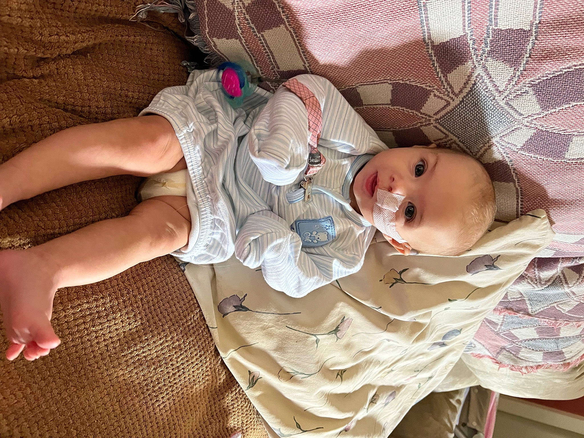 Amiyah joined the competition — help win amazing prizes! baby, baby_products, baby_toddler_clothing, cheek, child, comfort, eye, finger, hand, head, human_body, iris, linens, mouth, person, pink, skin, smile, textile, thigh