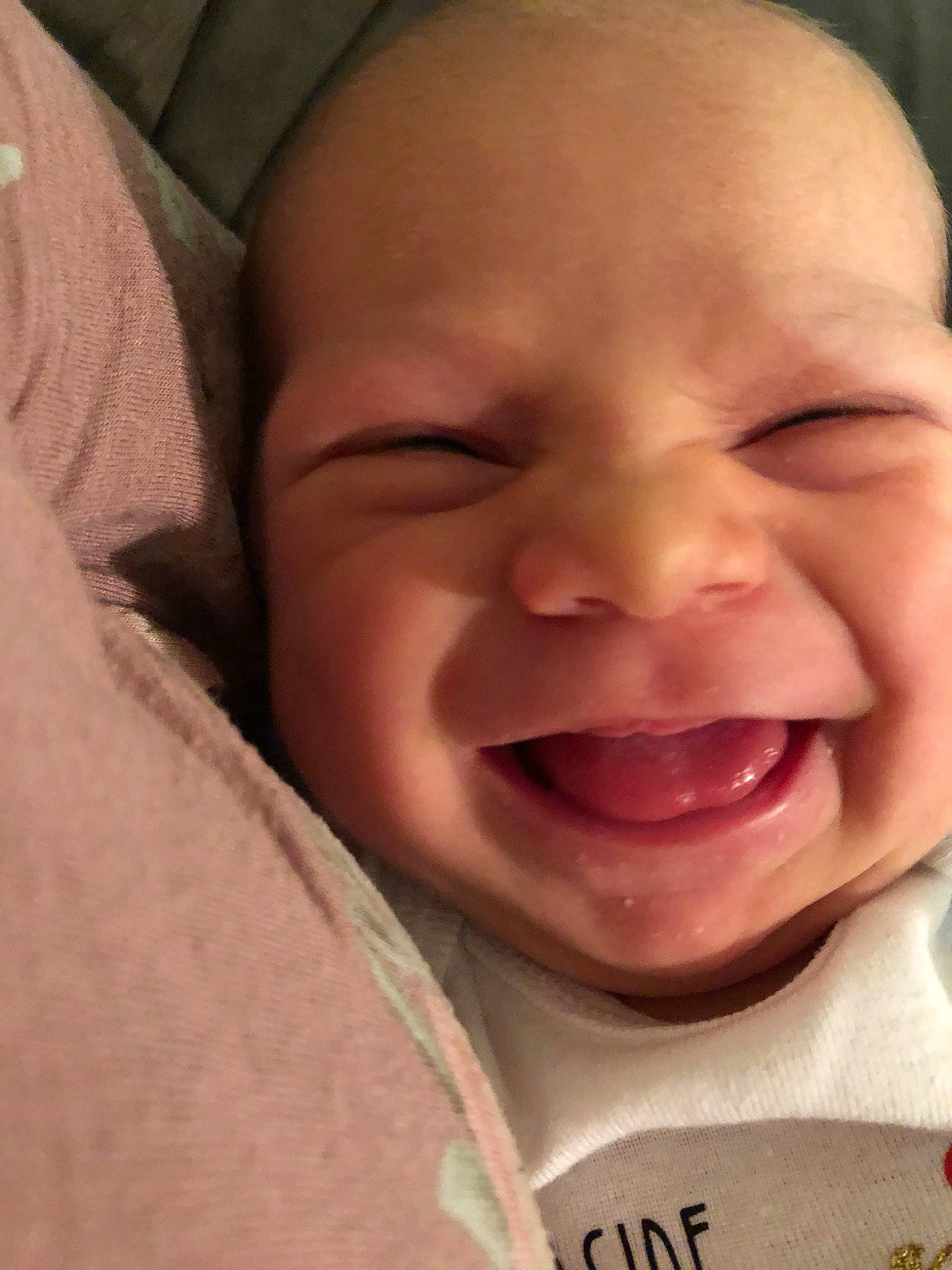 Madeleine is registered to the contest to win money with this photo: baby, baby_laughing, baby_making_funny_faces, cheek, child, chin, close_up, eyebrow, face, facial_expression, forehead, head, joy, laugh, lip, mouth, nose, person, skin, smile