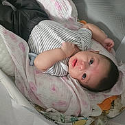 Gabe joined the competition — help win amazing prizes! baby, infant, crib, blanket, striped_shirt, dark_pants, pacifier, mesh_crib, bedding, soft, lying_down, looking_up, cute, child, indoor, cozy, comfortable, resting, small_hands, curious