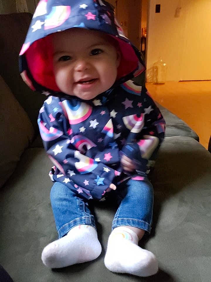 Adalyn is registered to the contest to win money with this photo: baby_toddler_clothing, baseball_cap, cap, cheek, chin, clothing, cool, eye, head, headwear, human_body, lip, person, pink, purple, skin, sleeve, smile, standing, t_shirt