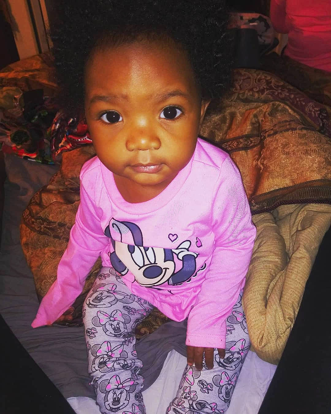 Ali is registered to the contest to win money with this photo: baby_toddler_clothing, black, cheek, chin, eye, face, facial_expression, forehead, hair, hairstyle, head, lip, mouth, nose, organ, person, pink, product, purple, skin