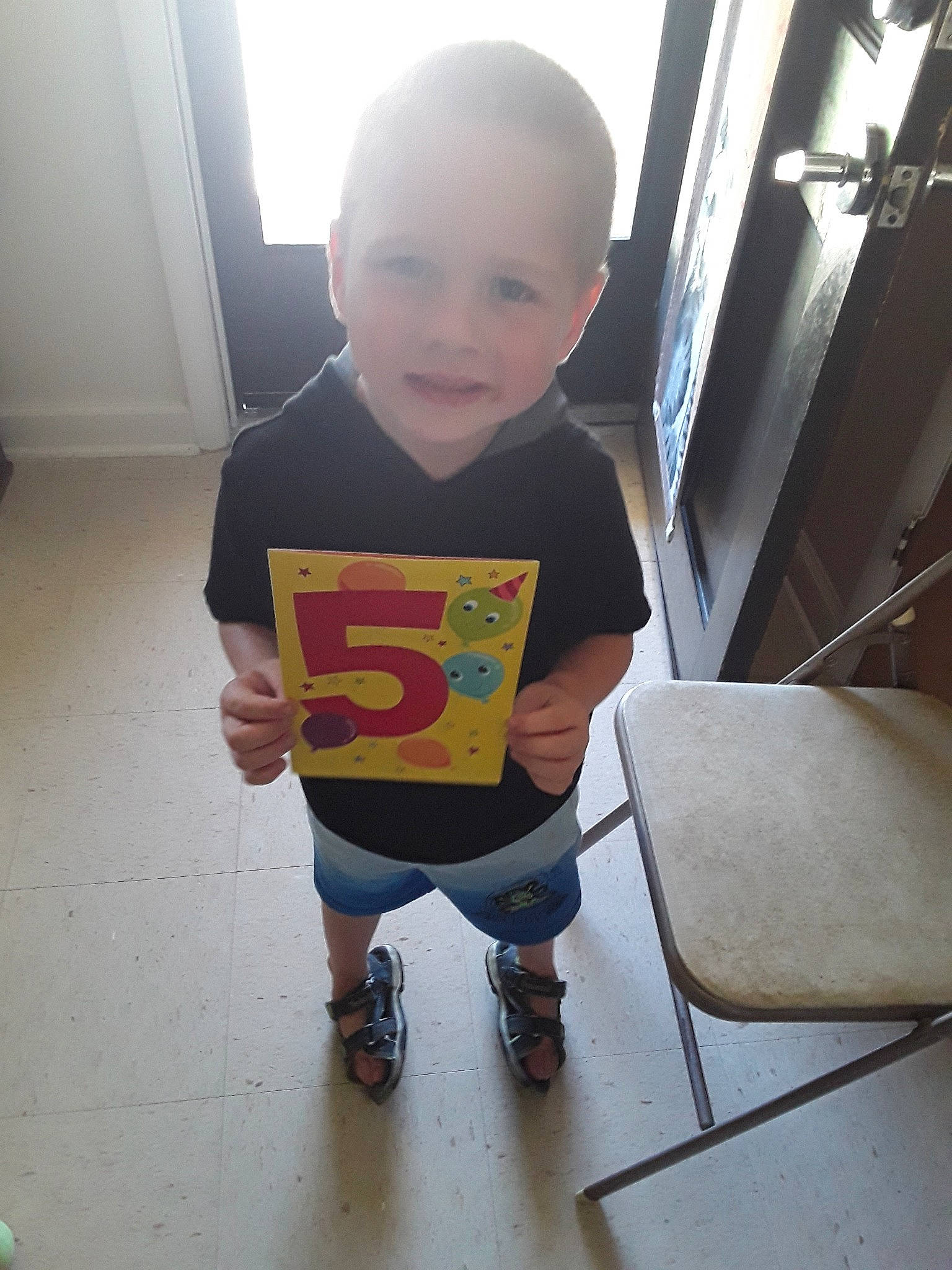 Shawn is registered to the contest to win money with this photo: child, floor, flooring, person, play, sleeve, standing, t_shirt, toddler