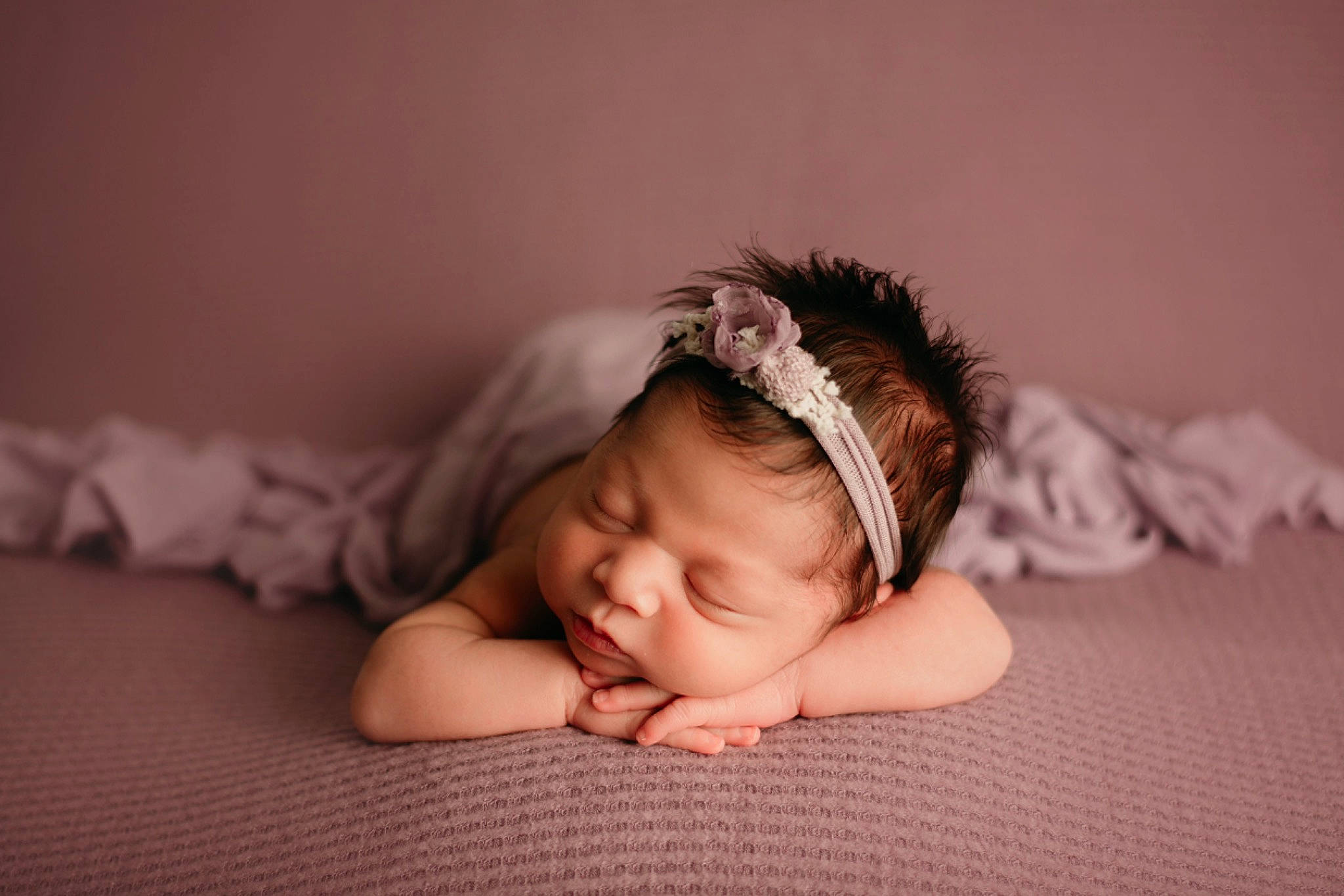 Saraí is registered to the contest to win money with this photo: baby, comfort, eye, eyelash, face, finger, flash_photography, flooring, gesture, grass, hand, happy, headband, headpiece, human_leg, jewellery, linens, person, skin, toddler
