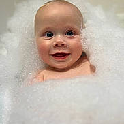 Jesse joined the competition — help win amazing prizes! baby, bath, bubbles, foam, smile, face, child, cute, water, skin, eyes, happy, clean, infant, portrait, closeup, childhood, playful, tub, relaxation