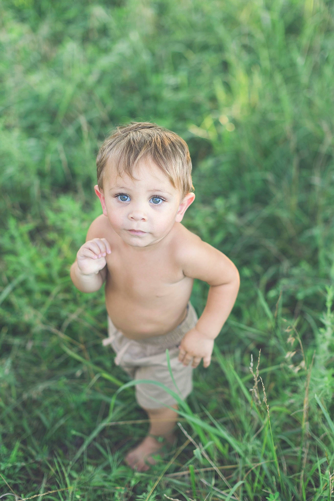 Legend joined the competition — help win amazing prizes! arm, baby, blond, eye, fawn, flash_photography, grass, grassland, hand, happy, human_body, meadow, people_in_nature, person, plant, sitting, terrestrial_plant, thumb, toddler, tree