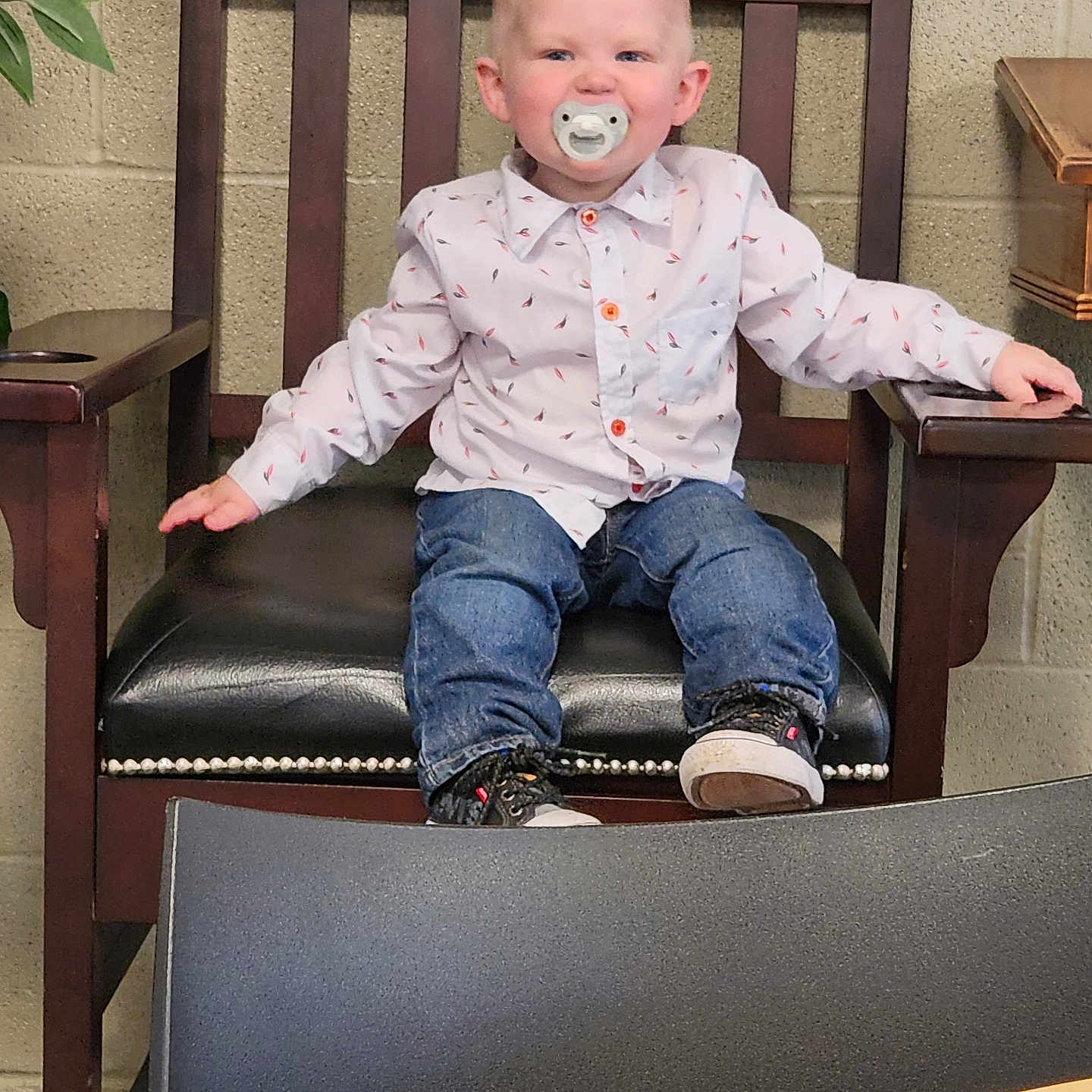 Corey is registered to the contest to win money with this photo: armchair, baby, chair, clothing, coat, cushion, face, footwear, furniture, head, homedecor, jacket, jeans, pants, person, photography, portrait, shoe, sitting, wood