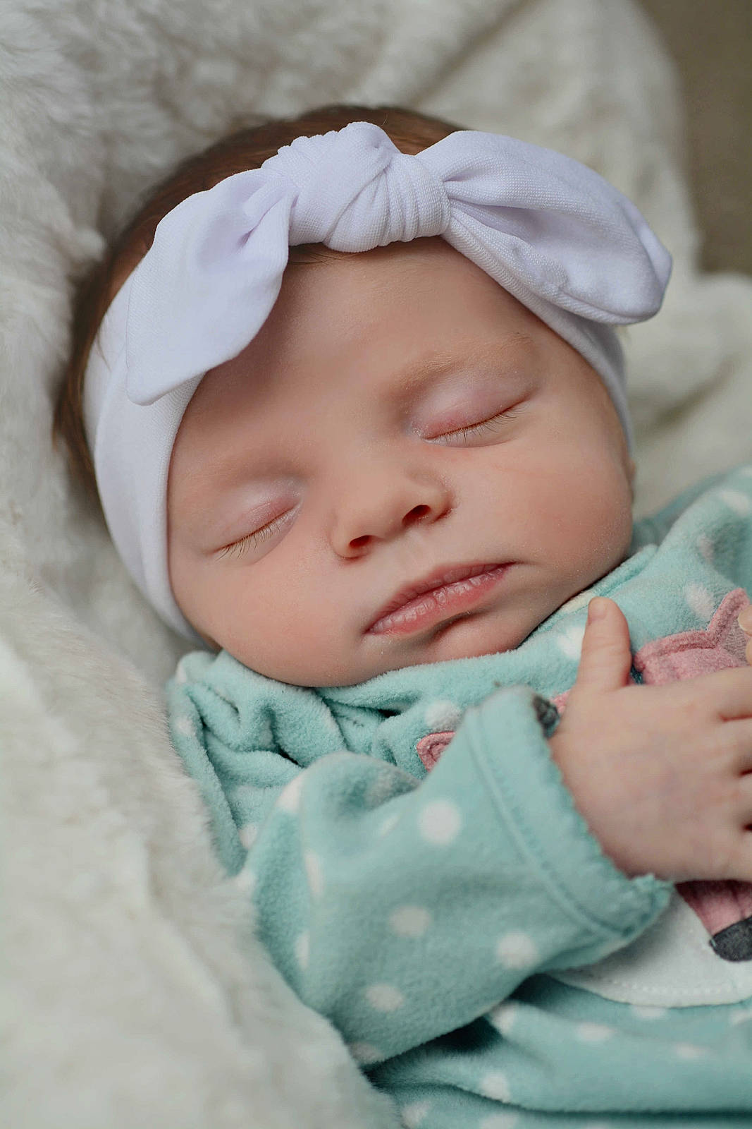 Aleah is registered to the contest to win money with this photo: baby, baby_products, baby_toddler_clothing, cap, cheek, child, chin, comfort, eye, face, hand, head, headwear, iris, linens, lip, nose, person, pink, skin