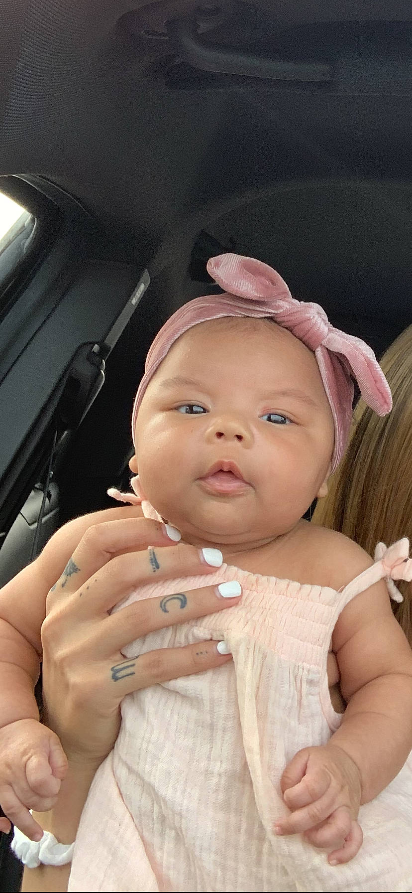 Jhene is registered to the contest to win money with this photo: baby, beauty, cheek, child, ear, eye, face, finger, forehead, hand, head, headgear, headwear, lip, nail, nose, person, photography, pink, product