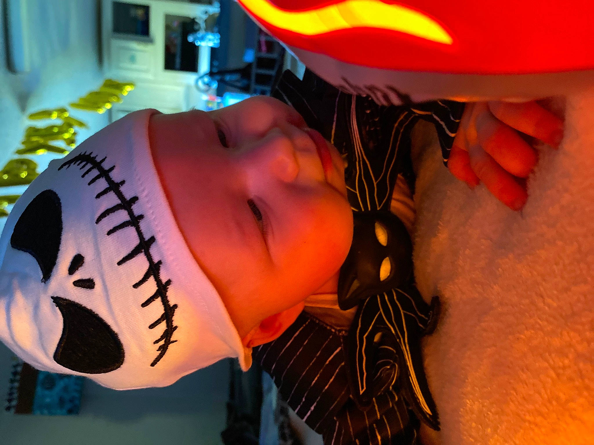 Jax joined the competition — help win amazing prizes! art, audio_equipment, black_hair, carmine, child, close_up, eyelash, eyewear, finger, fun, happy, headwear, jaw, mouth, nose, orange, person, personal_protective_equipment, smile, toddler