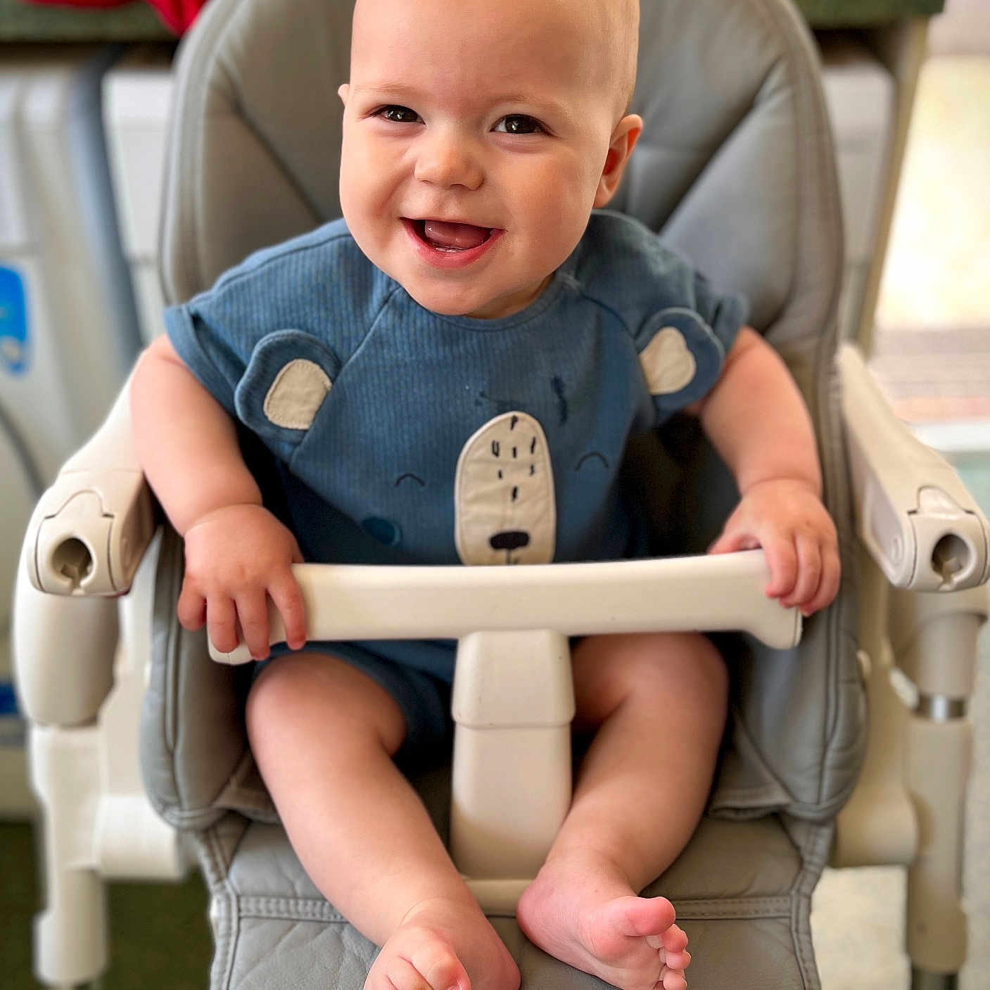 Joey is registered to the contest to win money with this photo: baby, babylaughing, bodypart, chair, clothing, cushion, face, finger, furniture, hand, happy, head, homedecor, laughing, person, photography, portrait, sitting, smile, t_shirt