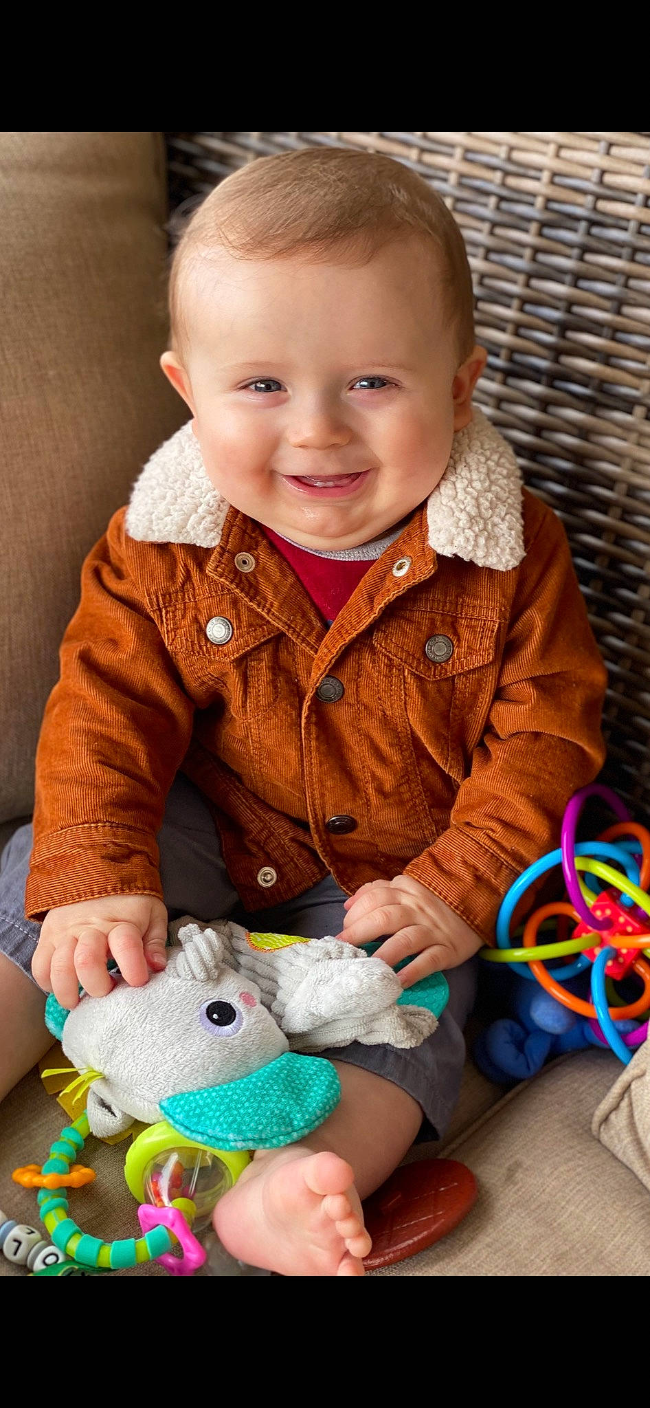 Kolt joined the competition — help win amazing prizes! arm, baby_toddler_clothing, cheek, eye, face, facial_expression, green, head, human, iris, joy, organ, person, photograph, product, skin, sleeve, smile, standing, textile