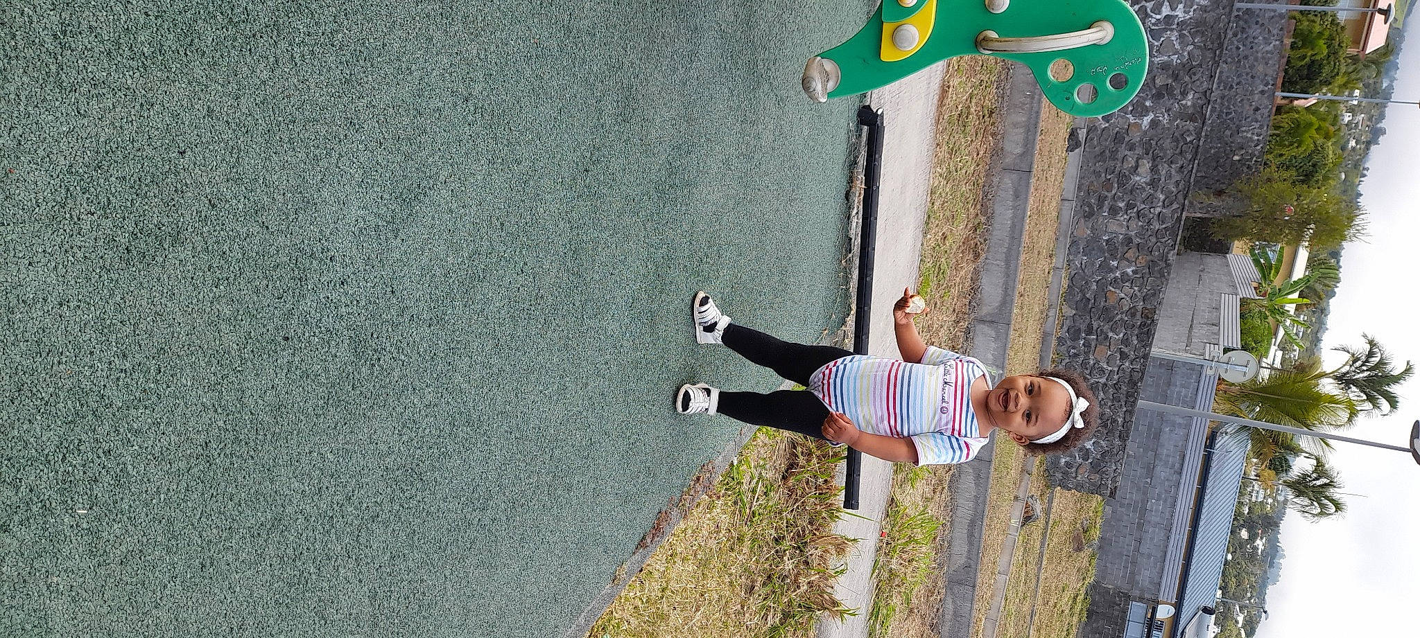 Abby-gaëlle participe au concours pour gagner de l'argent avec cette photo : adventure, asphalt, child, climbing, concrete, fun, grass, joy, leisure, person, plant, recreation, road_surface, rock_climbing_equipment, shadow, sidewalk, sneakers, sport_climbing, t_shirt, toy