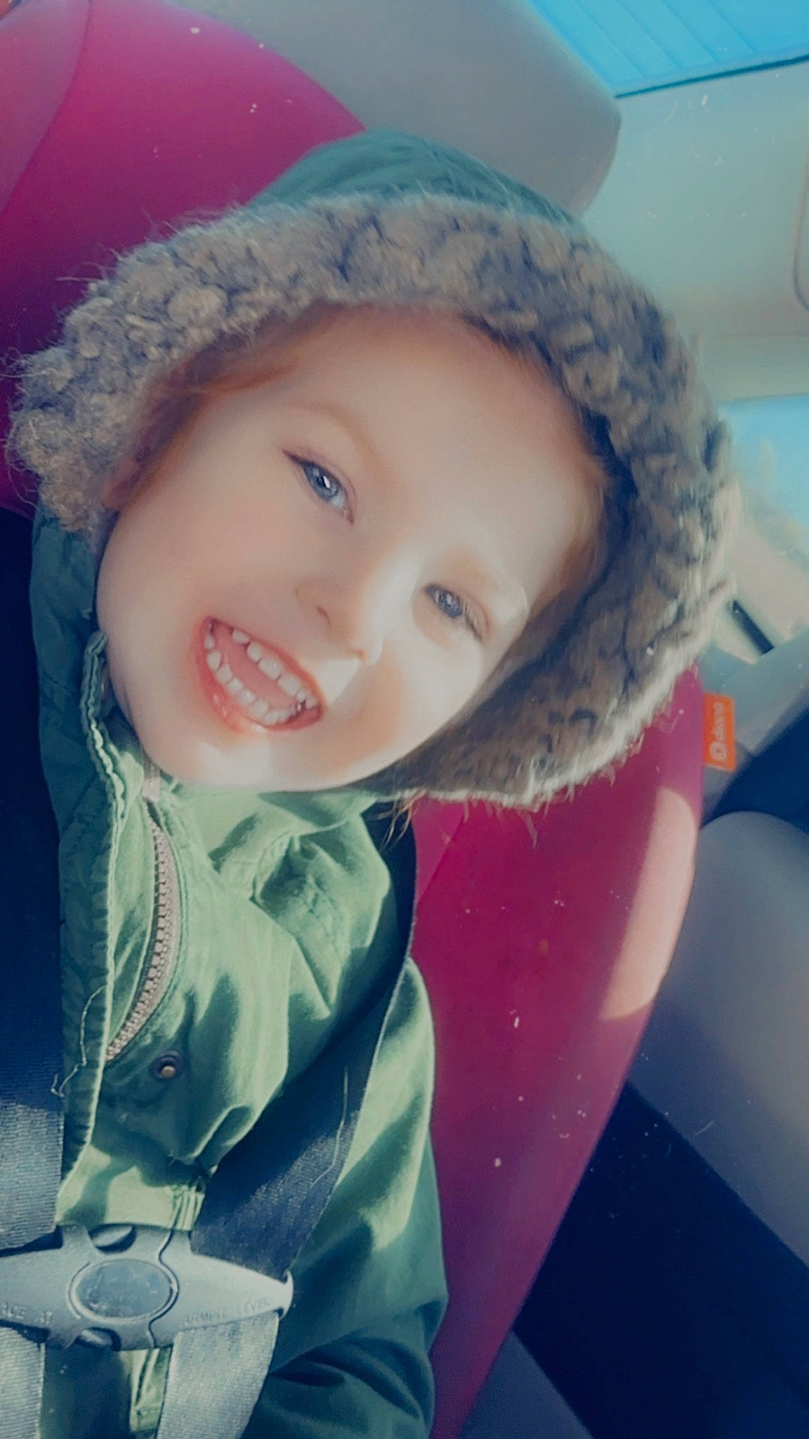 Octavia is registered to the contest to win money with this photo: cap, cheek, chin, cloud, cool, eye, eyebrow, flash_photography, freezing, happy, headgear, headwear, human_body, iris, joy, lip, mouth, nose, outerwear, person