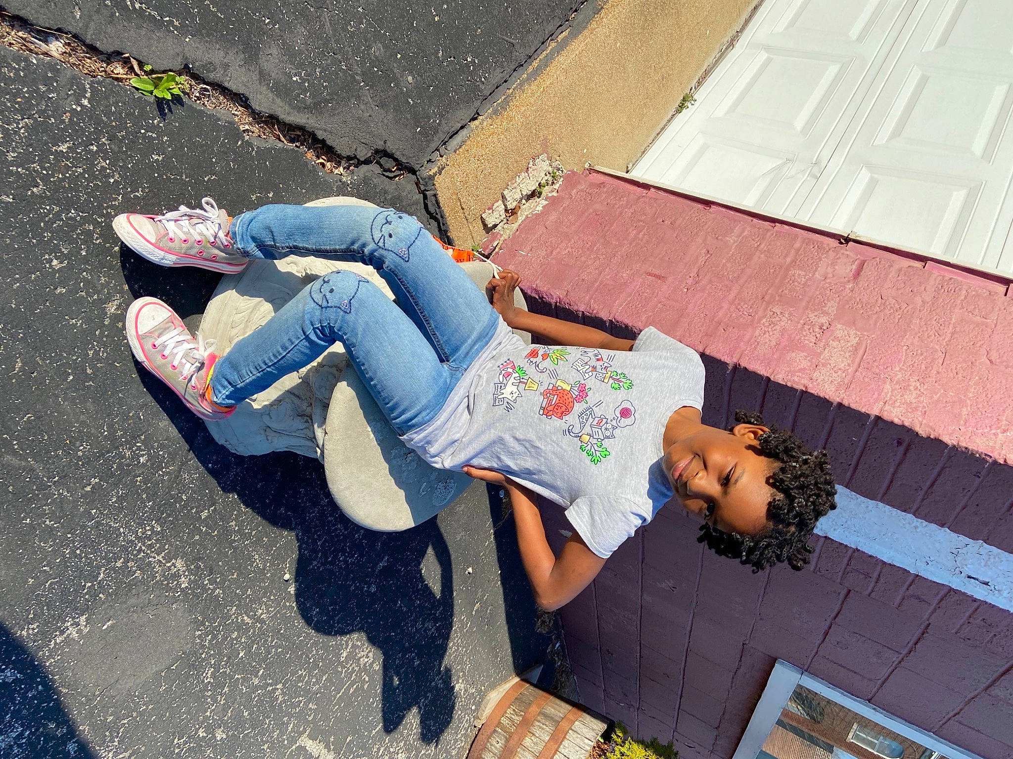 Zari joined the competition — help win amazing prizes! asphalt, denim, electric_blue, eyewear, fun, human_leg, joint, joy, knee, leg, leisure, pattern, person, road_surface, shoe, sidewalk, sitting, street, street_fashion, t_shirt