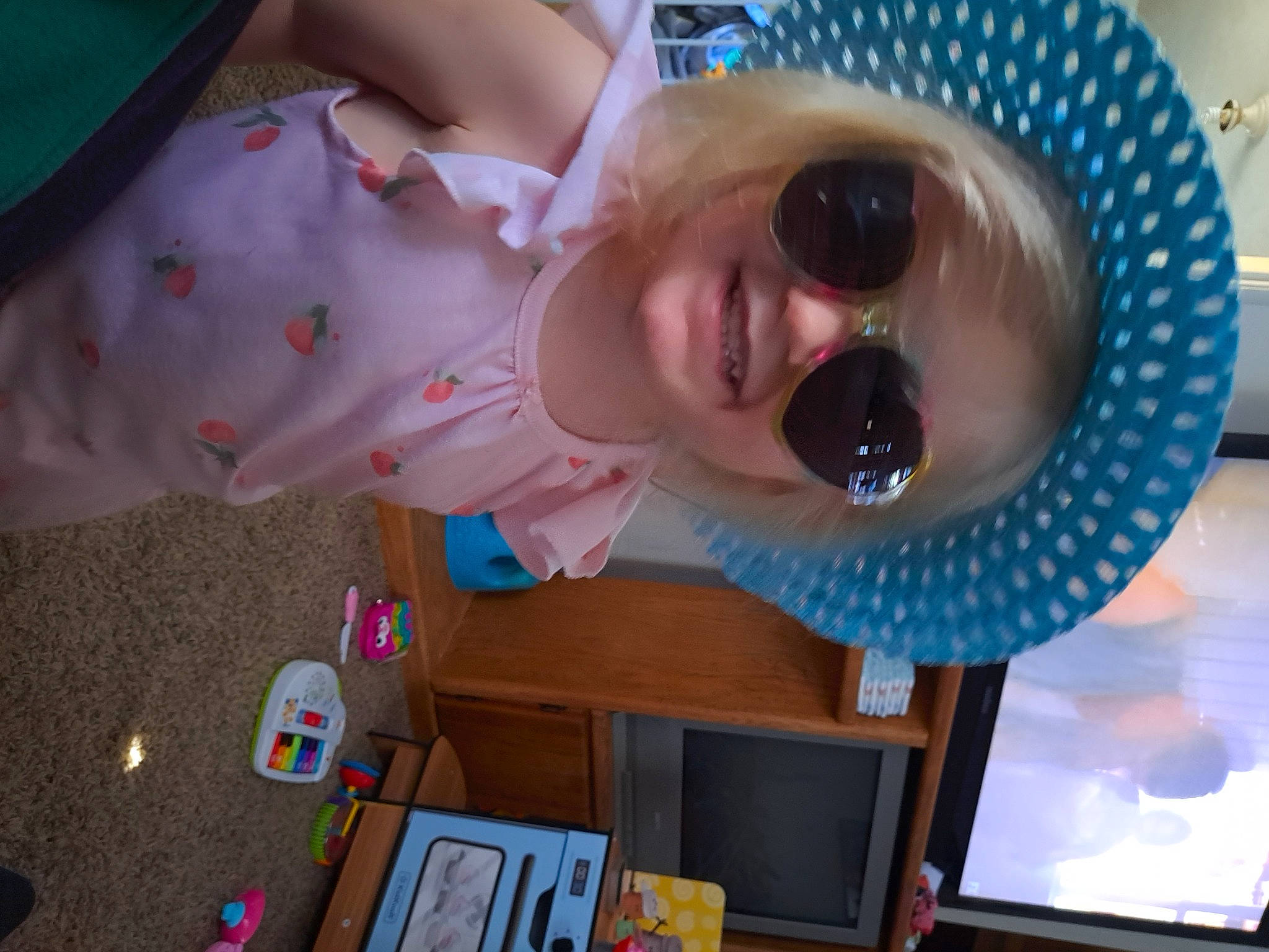 Tylee joined the competition — help win amazing prizes! baby, baby_products, baby_toddler_clothing, child, eyelash, eyewear, fashion_accessory, fun, goggles, happy, hat, joy, person, personal_protective_equipment, pink, room, smile, sunglasses, toddler, vision_care