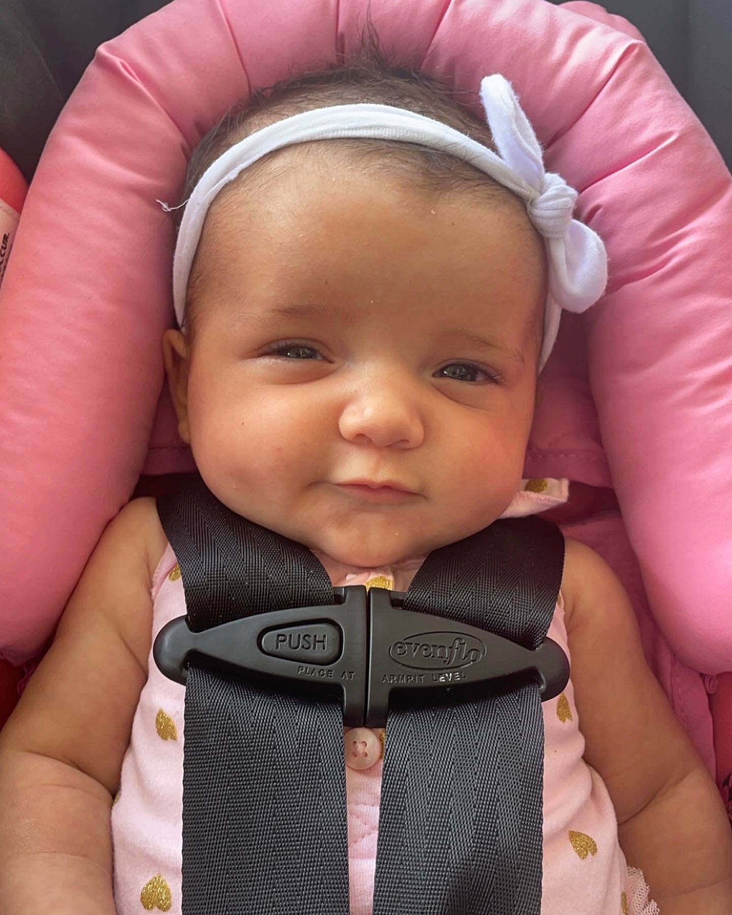 Marianna is registered to the contest to win money with this photo: arm, baby, baby_carriage, baby_toddler_clothing, cheek, child, comfort, eyelash, facial_expression, hand, happy, lip, mouth, nail, nose, person, pink, skin, smile, thumb