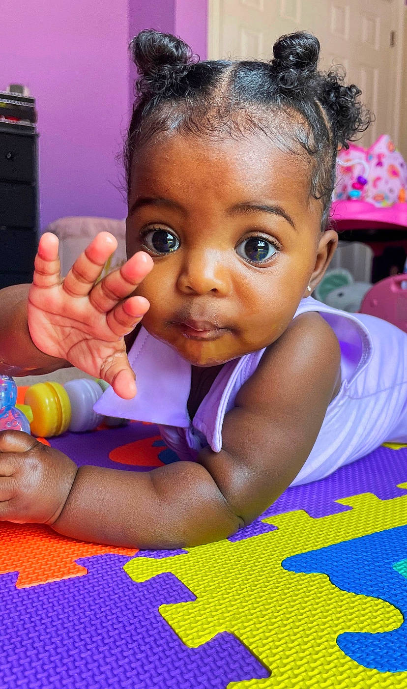 Rihanna joined the competition — help win amazing prizes! black_hair, cheek, child, chin, eyebrow, eyelash, facial_expression, gesture, hairstyle, hand, happy, iris, leisure, lip, nose, person, product, purple, skin, smile